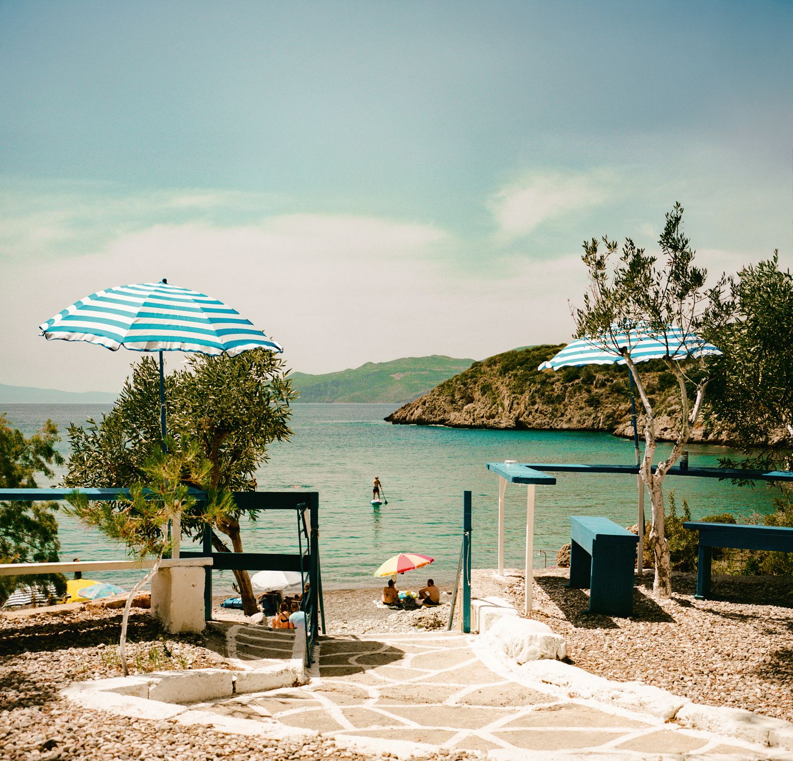 Image may contain Summer Architecture Building Outdoors Shelter Beach Coast Nature Sea Shoreline and Water