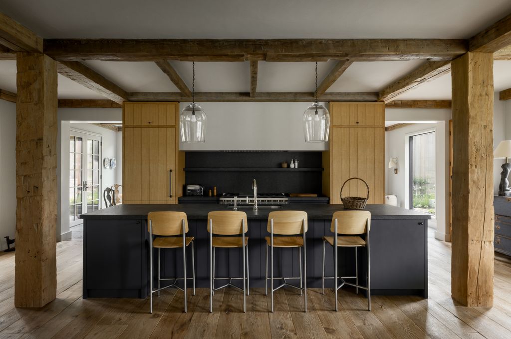 Image may contain Indoors Interior Design Kitchen Architecture Building Dining Room Dining Table Furniture and Room