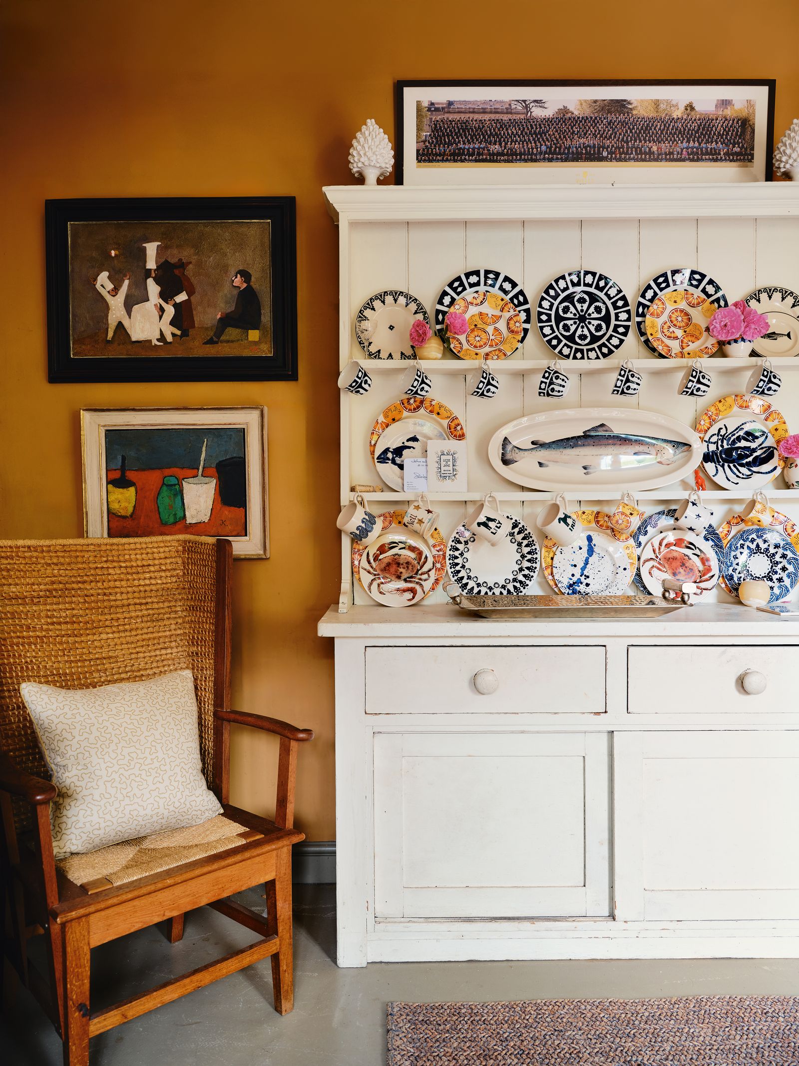 Image may contain Chair Furniture Art Painting Home Decor Rug Person Plate Indoors Interior Design and Porcelain