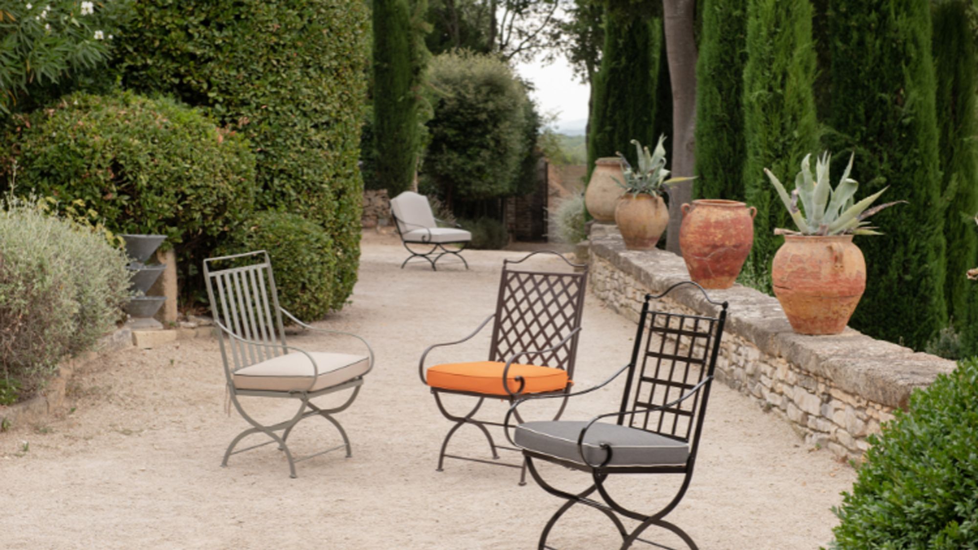 Image may contain: Backyard, Nature, Outdoors, Yard, Chair, Furniture, Plant, Architecture, Building, House, and Housing