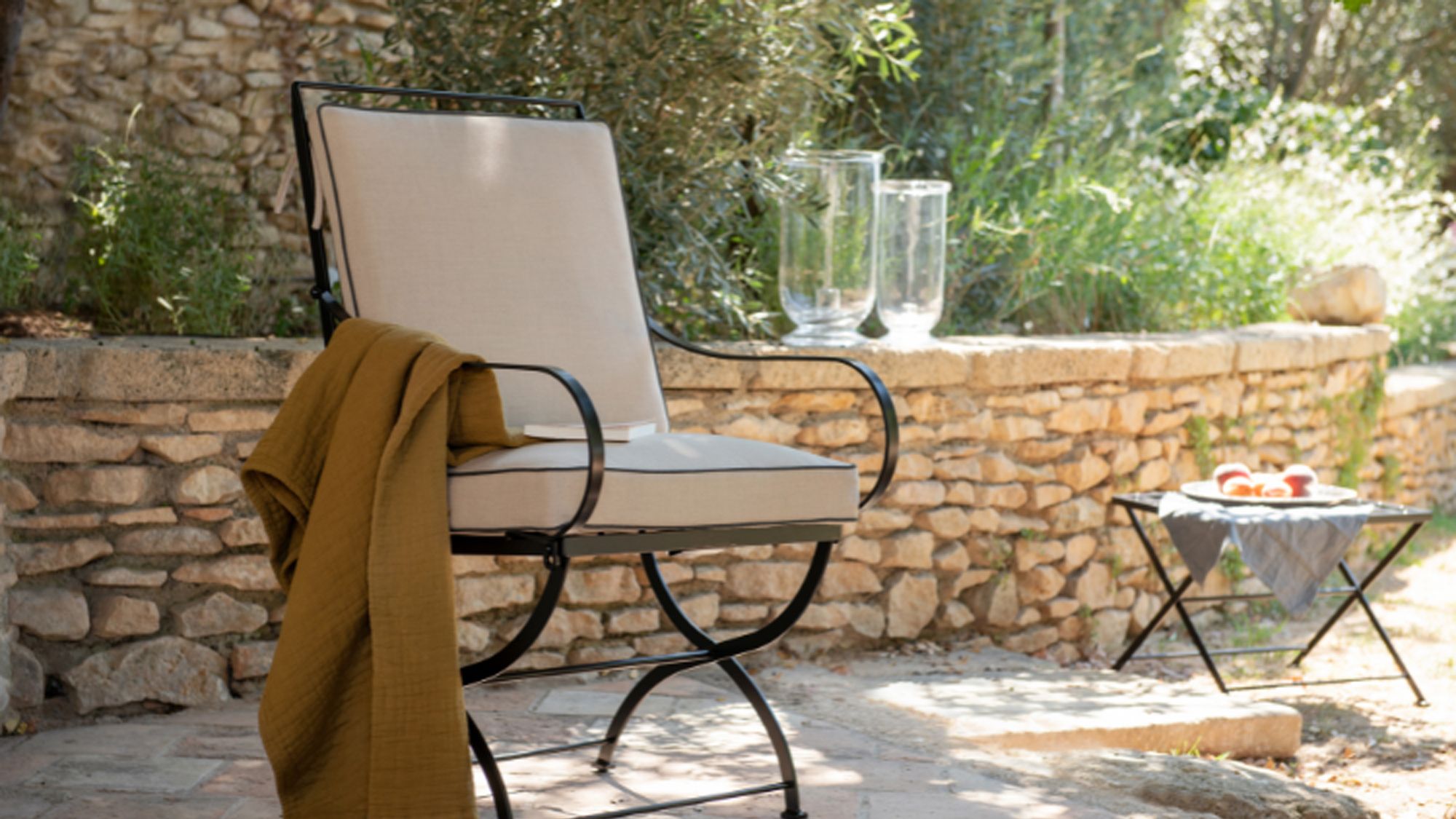 Image may contain: Chair, Furniture, Architecture, Building, House, Housing, Patio, Desk, Table, Backyard, and Nature