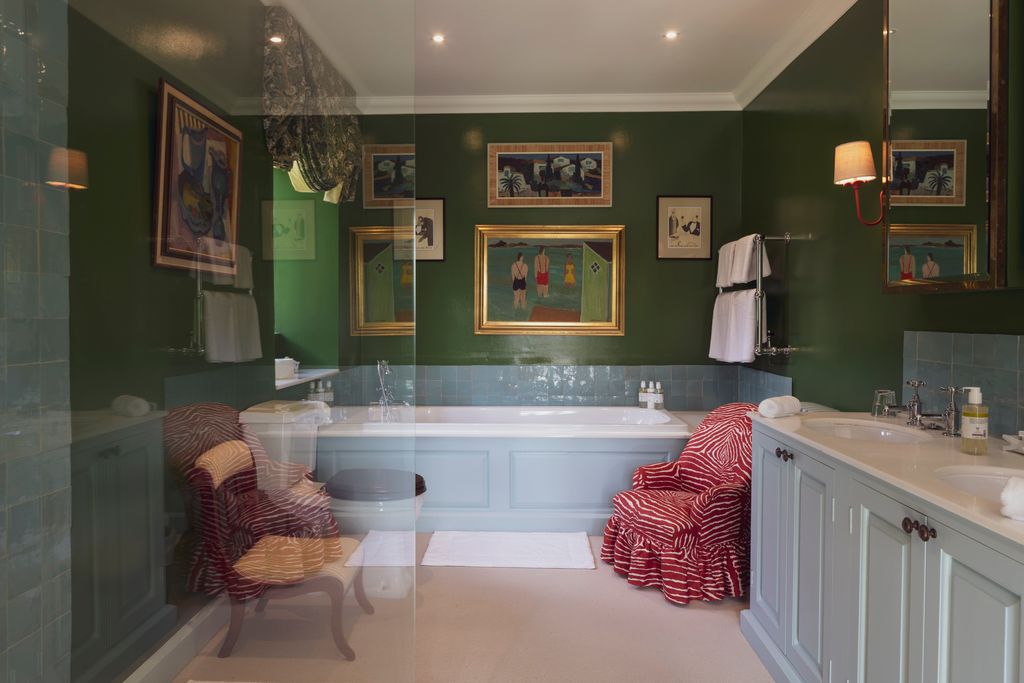 Image may contain Corner Lamp Art Painting Chair Furniture Person Sink Bathing Bathtub Tub and Indoors