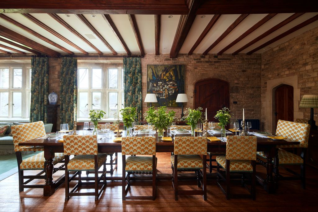 Image may contain Architecture Building Dining Room Dining Table Furniture Indoors Room Table and Interior Design