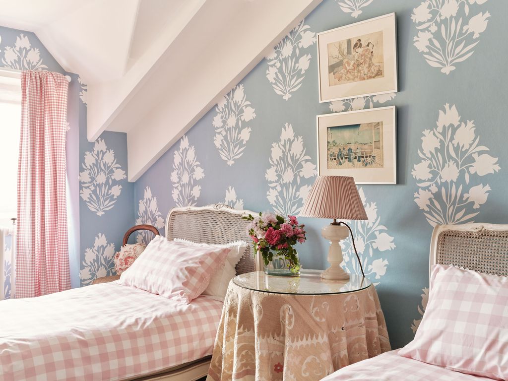 Image may contain Lamp Home Decor Bed Furniture Art Painting Cushion Desk Table Table Lamp Indoors and Bedroom