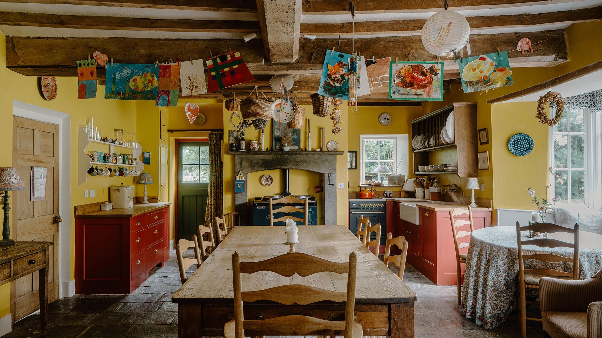 Image may contain: Architecture, Building, Dining Room, Dining Table, Furniture, Indoors, Room, Table, Desk, Lamp, and Chair