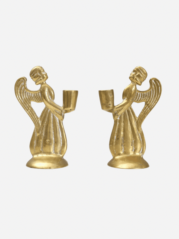 Image may contain: Gold, Bronze, Person, Candle, and Head