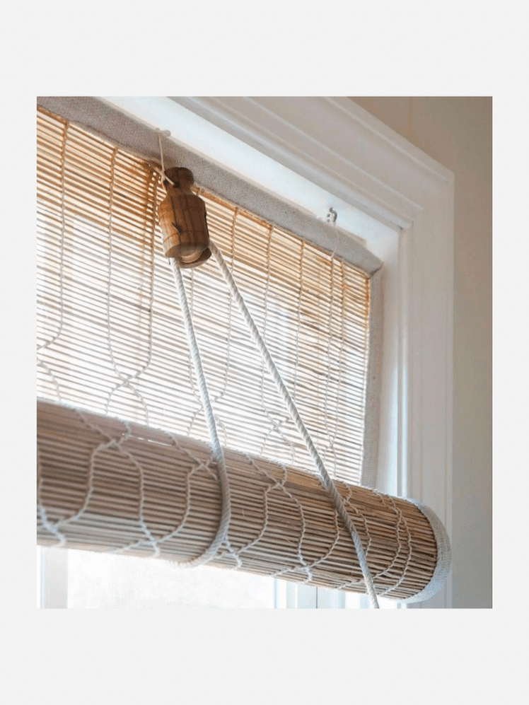 Image may contain: Home Decor, Curtain, Window Shade, Indoors, and Interior Design