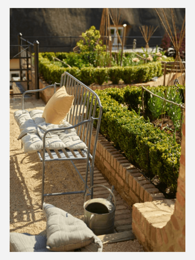 Image may contain: Indoors, Interior Design, Cushion, Home Decor, Garden, Nature, Outdoors, Jar, Plant, and Planter