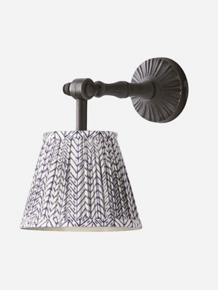 Image may contain: Lamp, Lampshade, Indoors, Bathroom, Room, and Shower Faucet