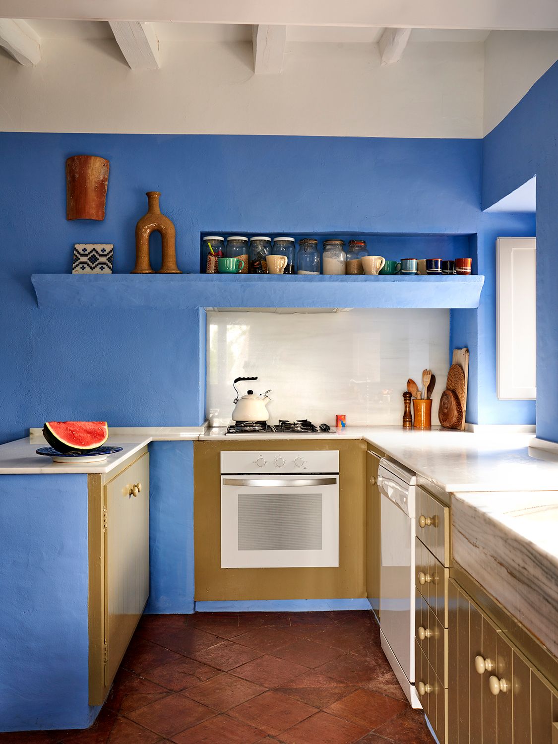 Image may contain Indoors Kitchen Interior Design Cooktop Cup Food Fruit Plant and Produce