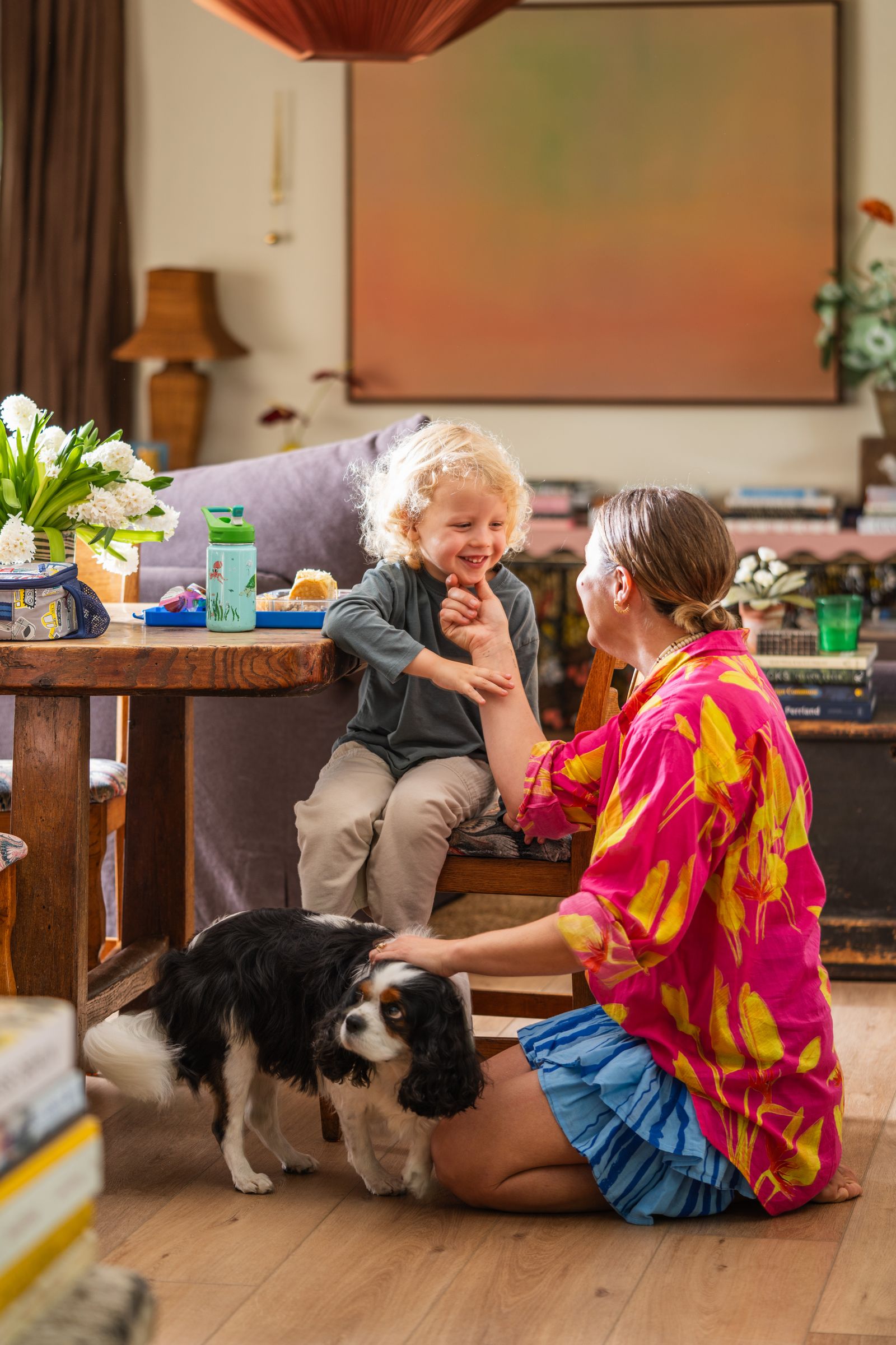 Image may contain Plant Potted Plant Face Head Person Photography Portrait Lamp Wood Dining Table and Furniture