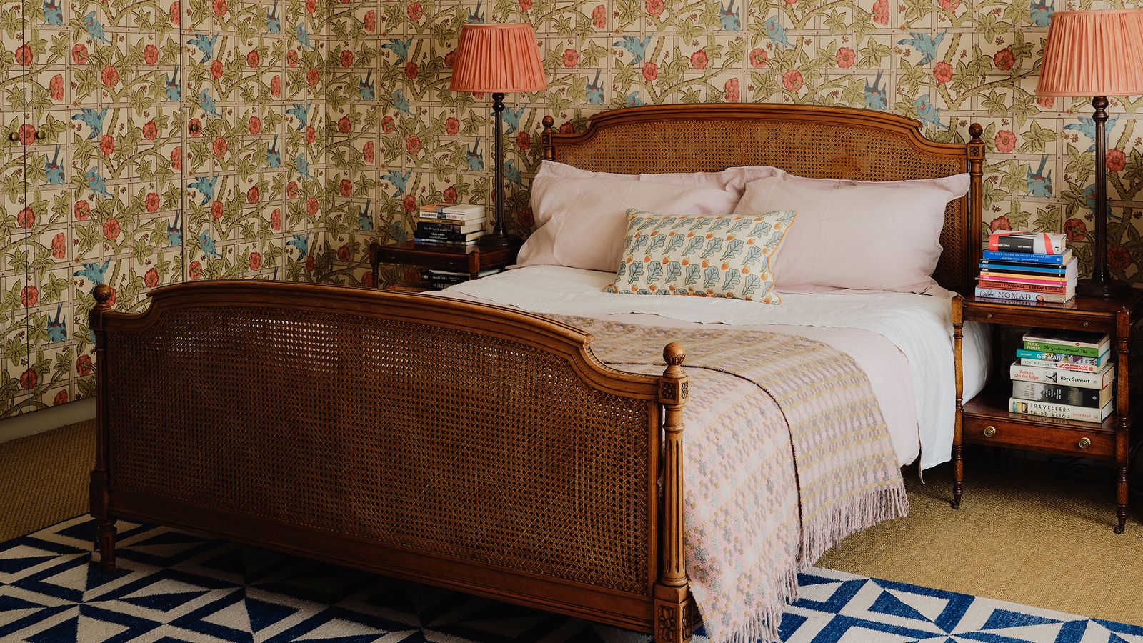 Image may contain: Home Decor, Rug, Lamp, Bed, Furniture, Indoors, Interior Design, Cushion, Bedroom, and Room