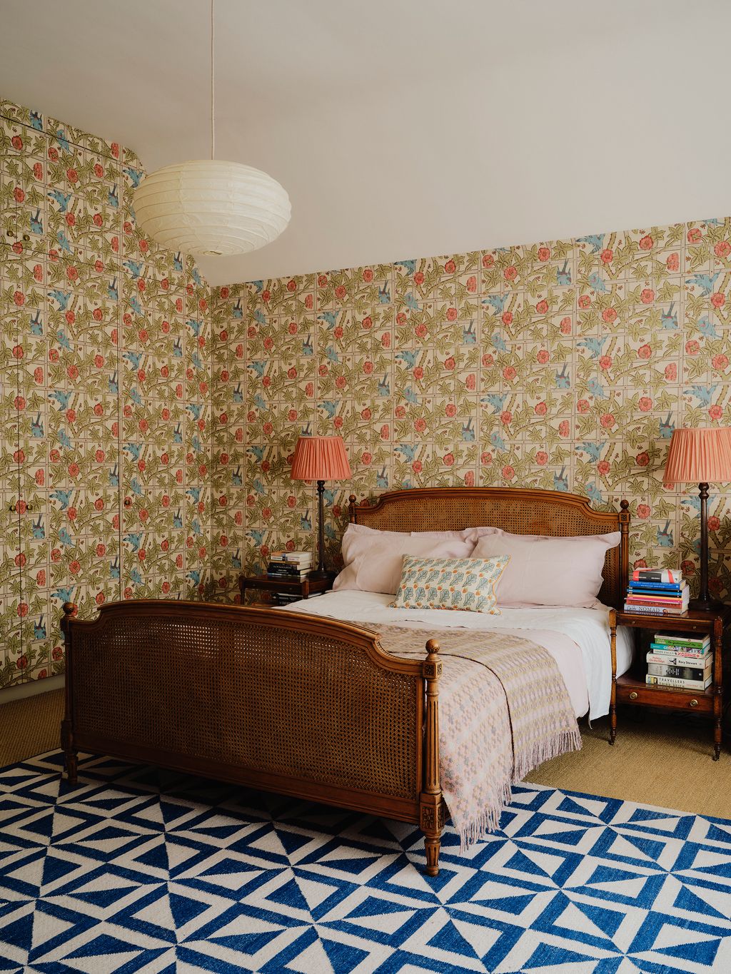 Image may contain Home Decor Rug Lamp Bed Furniture Indoors Interior Design Cushion Bedroom and Room