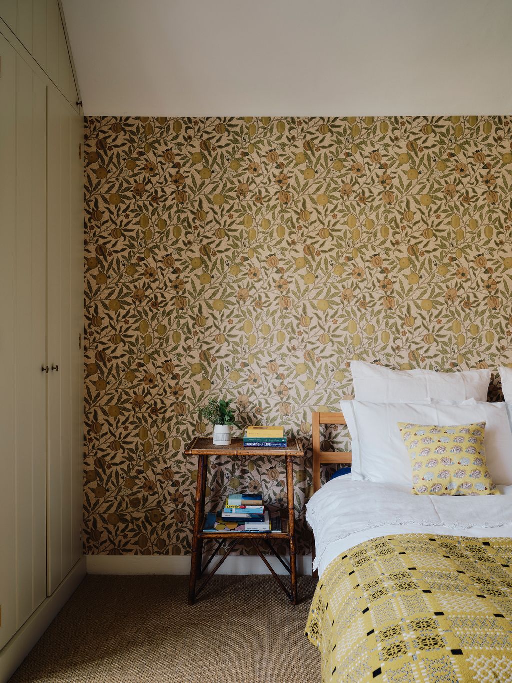 Image may contain Indoors Interior Design Plant Home Decor Cushion Bed Furniture and Wood Panels