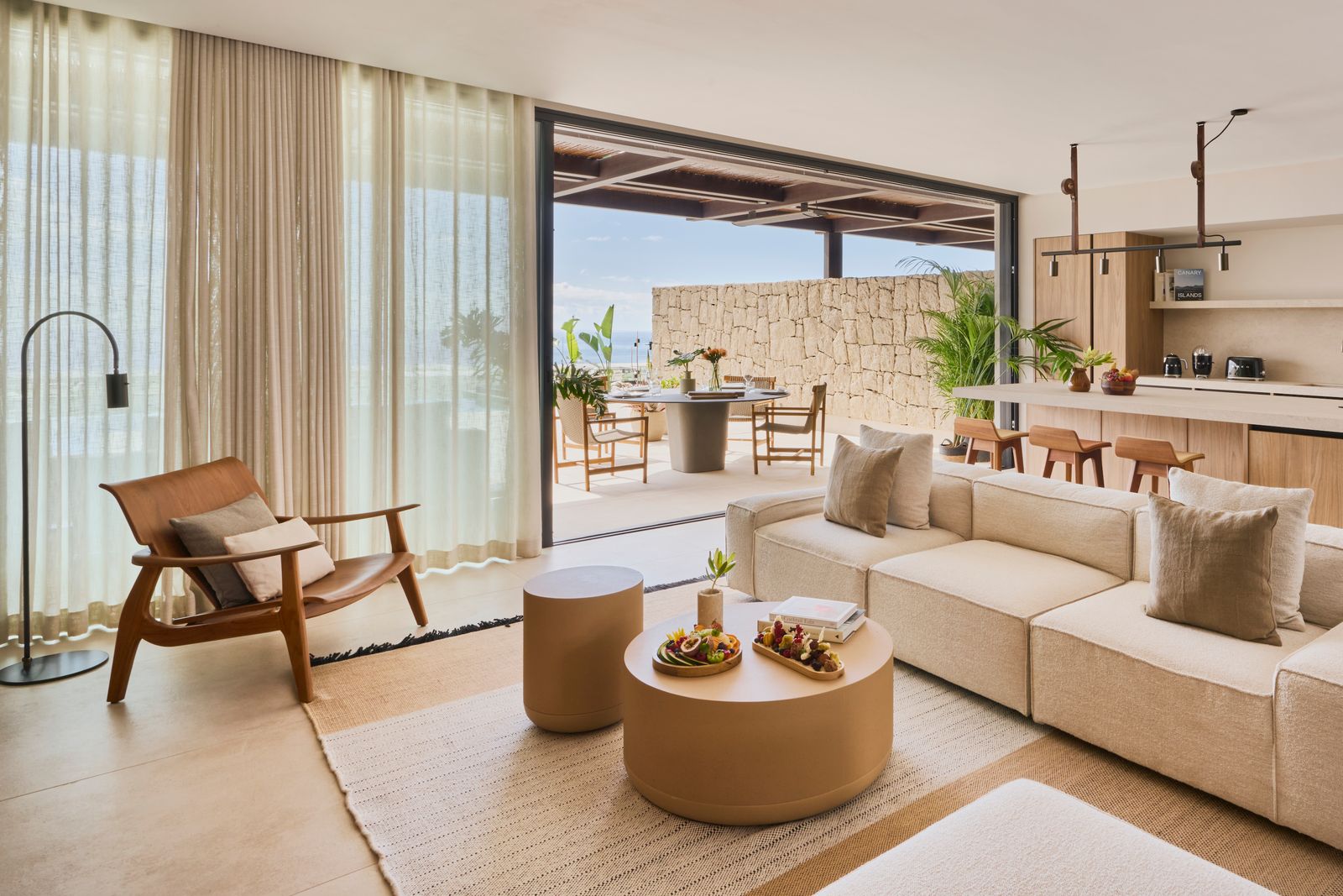 Image may contain Home Decor Architecture Building Furniture Indoors Living Room Room Coffee Table Table and Chair