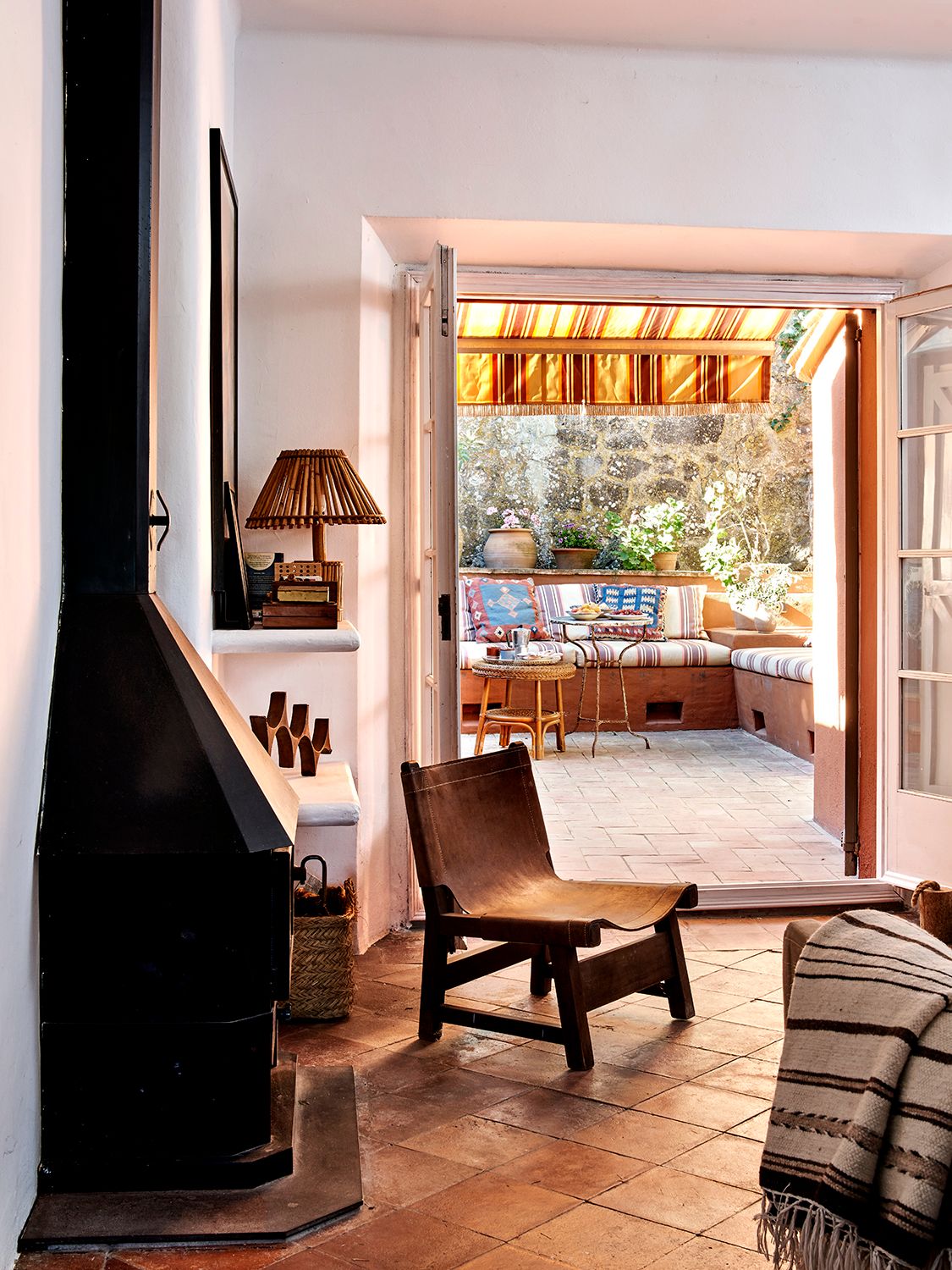 Image may contain Chair Furniture Floor Indoors Interior Design Lamp Architecture Building Living Room and Room