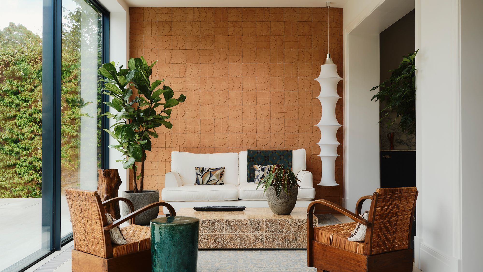 Image may contain: Indoors, Interior Design, Plant, Home Decor, Chair, Furniture, Architecture, Building, and Living Room