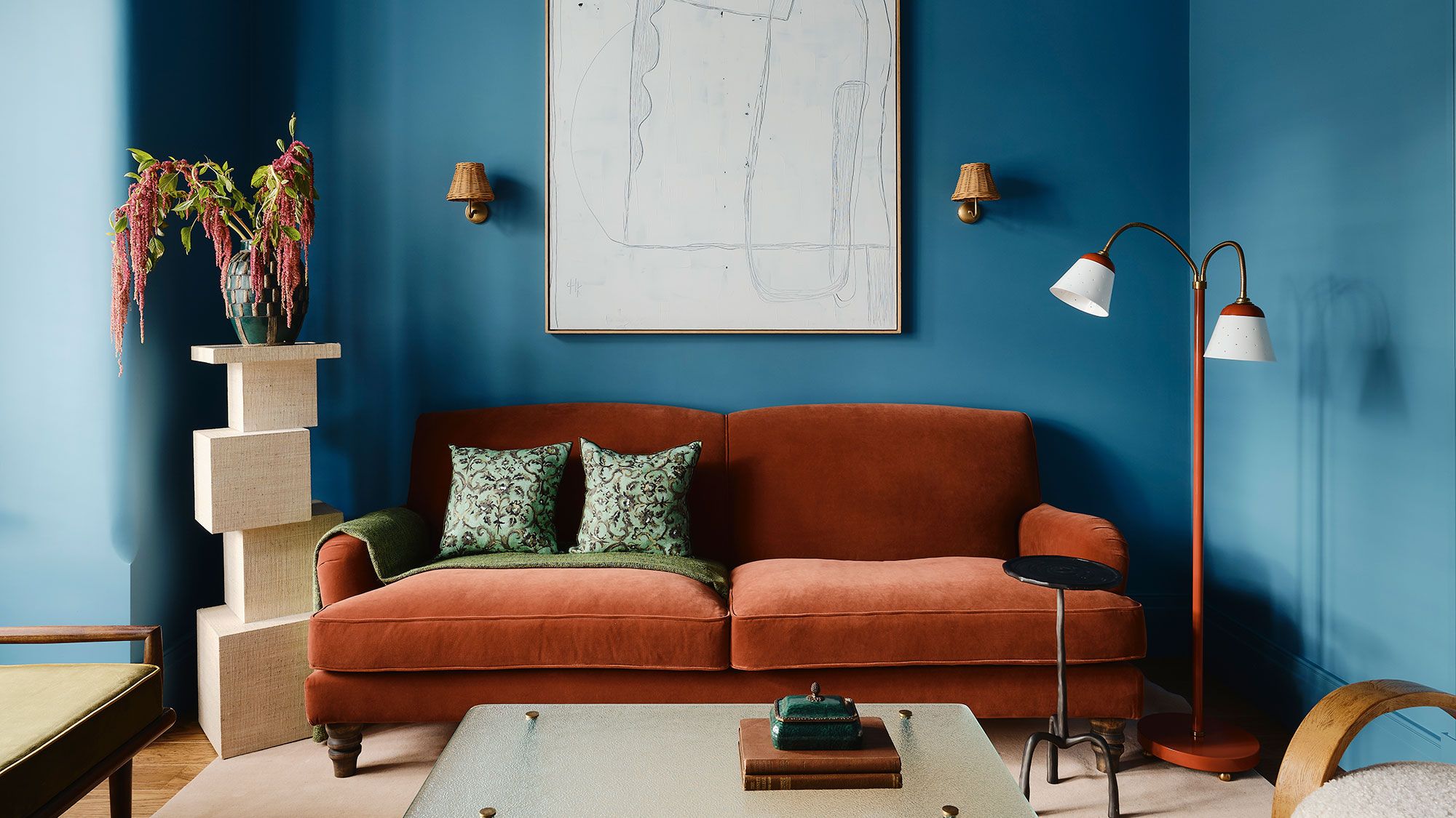 Image may contain: Lamp, Couch, Furniture, Architecture, Building, Indoors, Living Room, Room, Home Decor, Chair, and Table