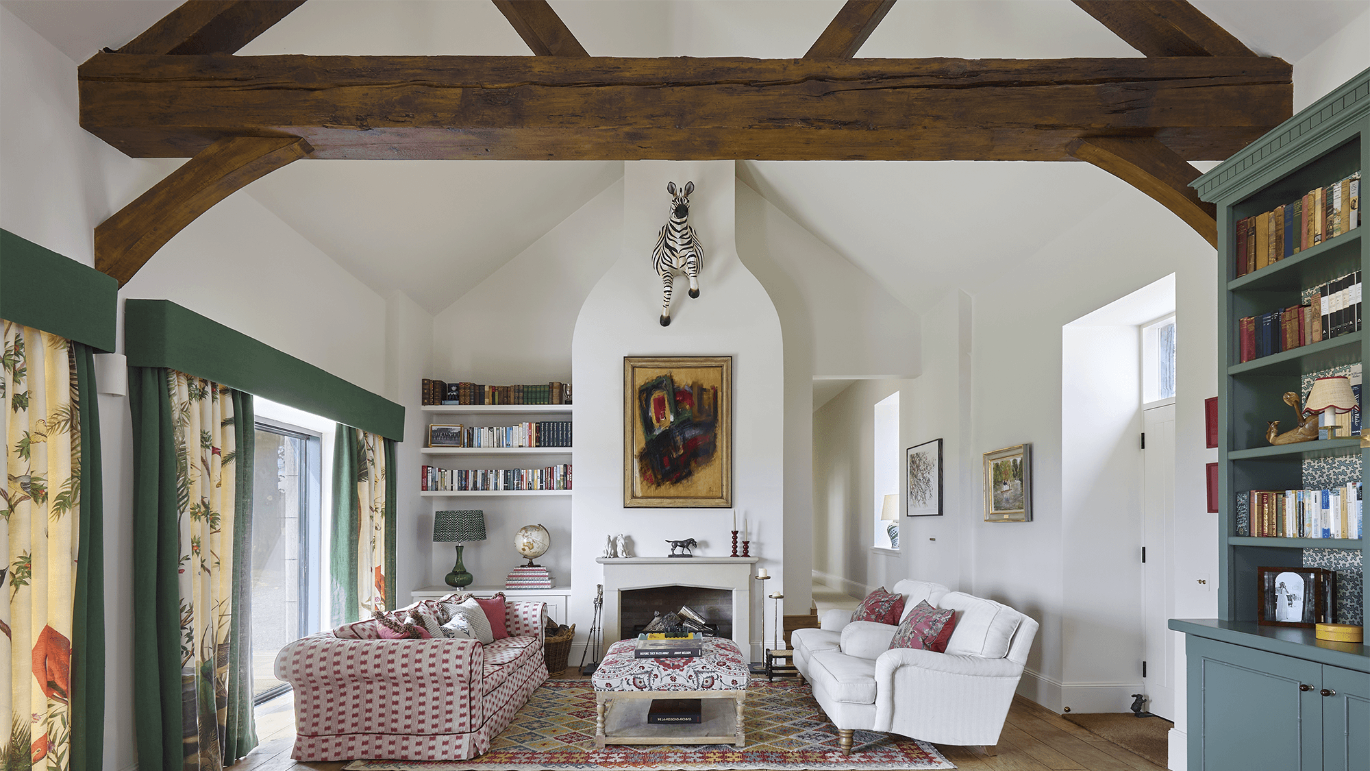 Image may contain: Architecture, Building, Furniture, Indoors, Living Room, Room, Home Decor, Couch, and Interior Design