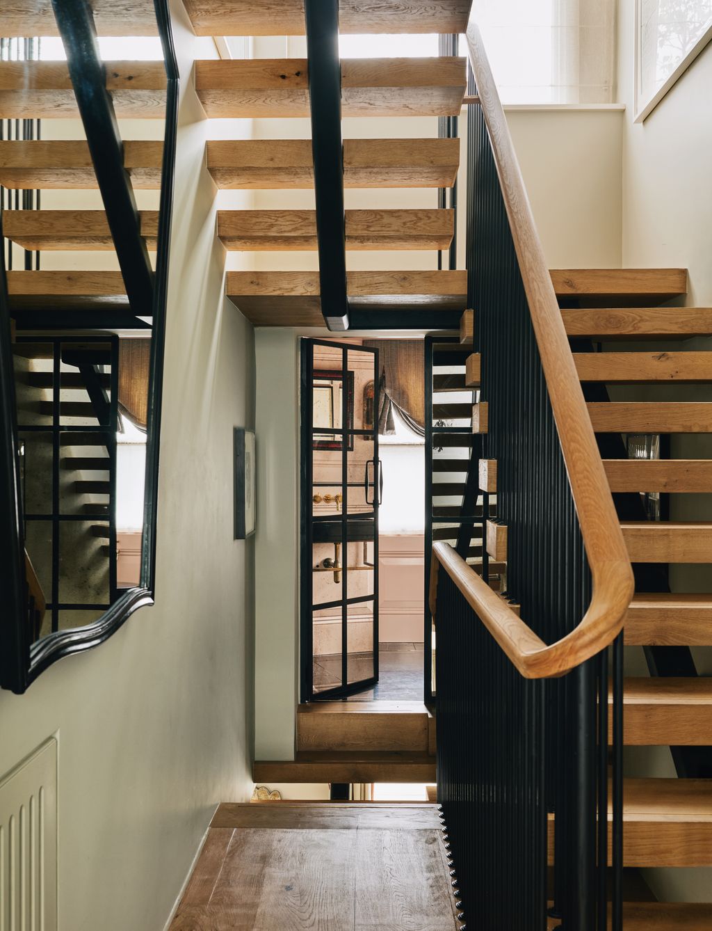 Image may contain Architecture Building Foyer Indoors Interior Design House Housing Staircase and Wood