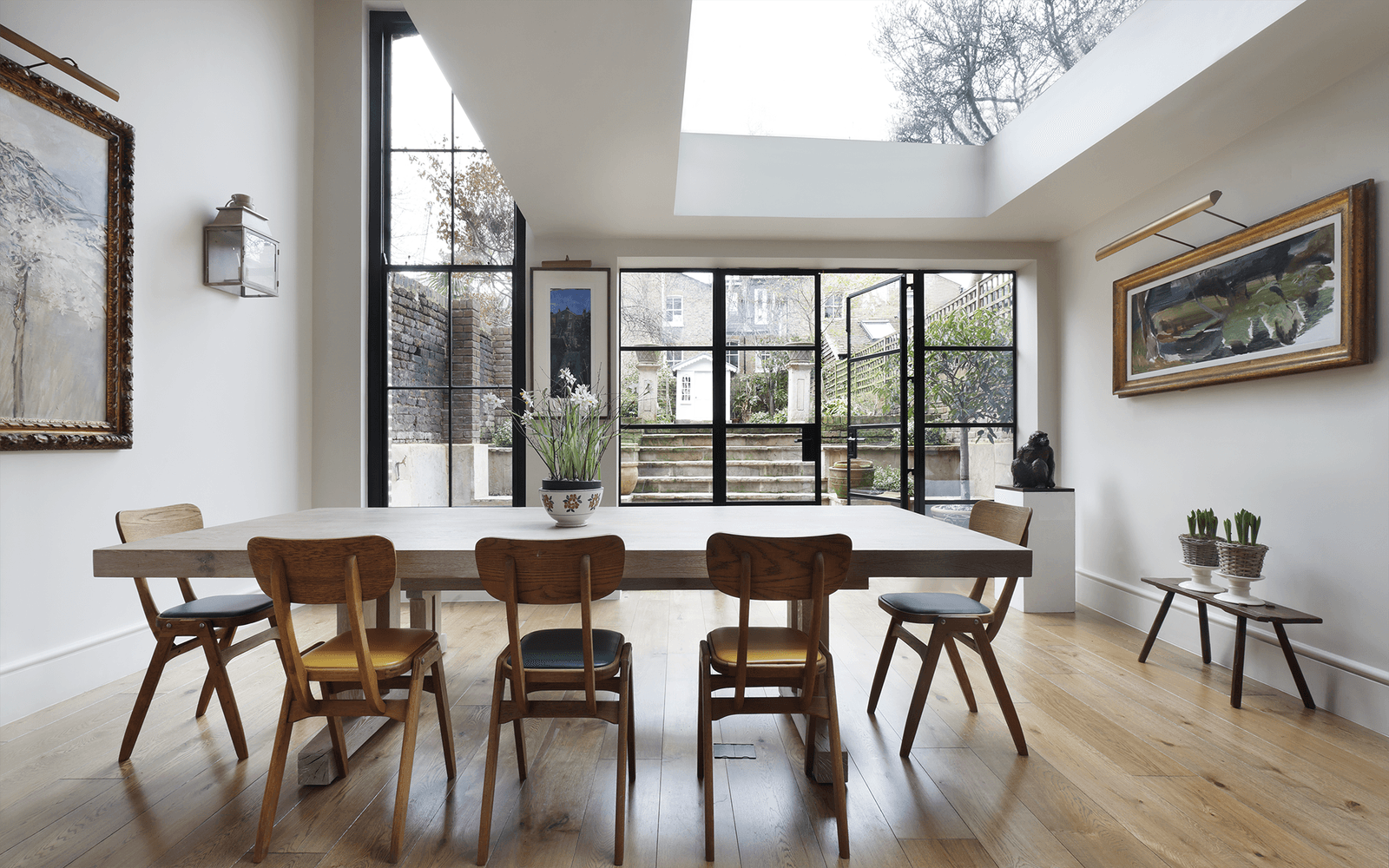 Image may contain Architecture Building Dining Room Dining Table Furniture Indoors Room Table and Interior Design