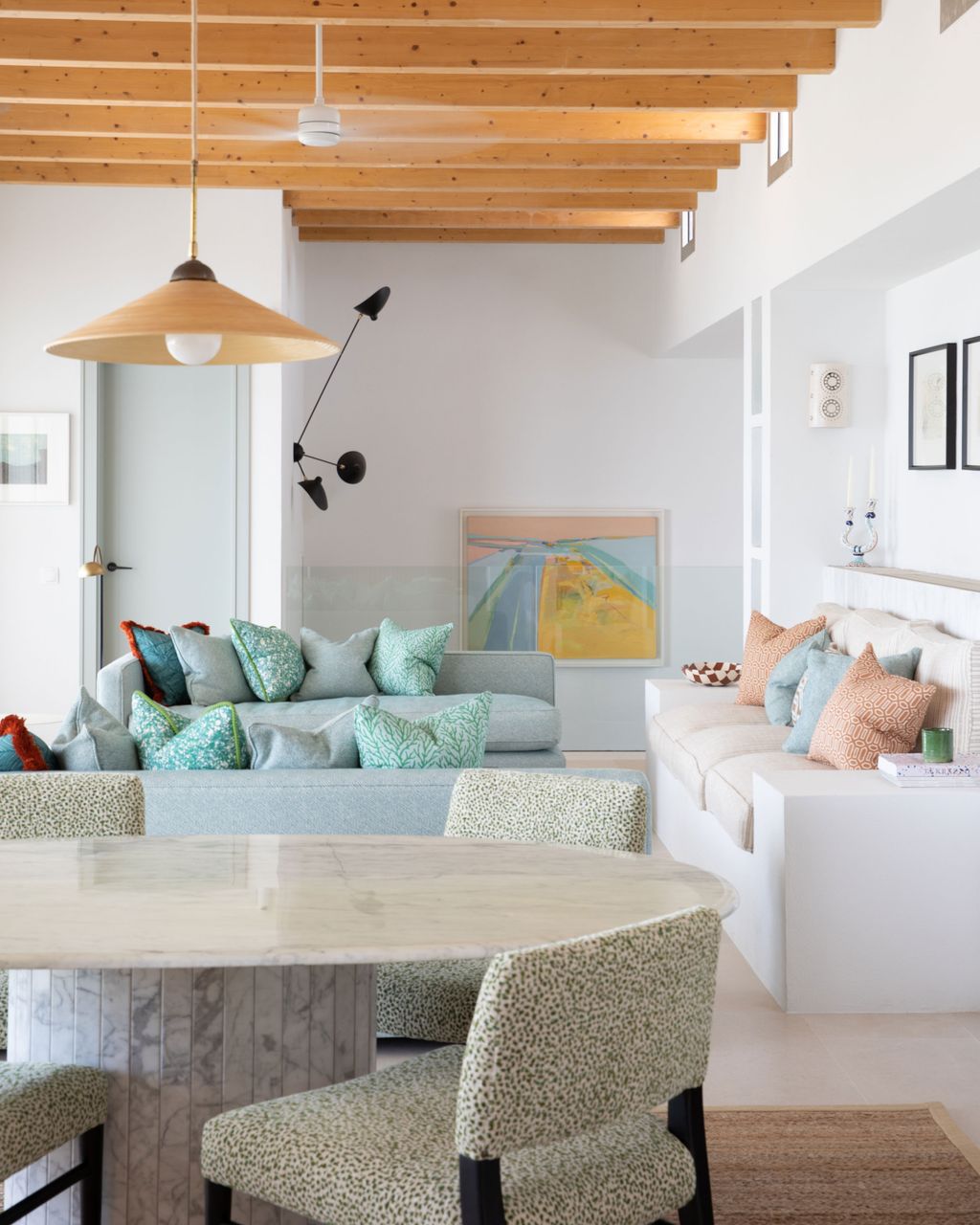 Image may contain Indoors Interior Design Home Decor Furniture Table Architecture Building Living Room and Room