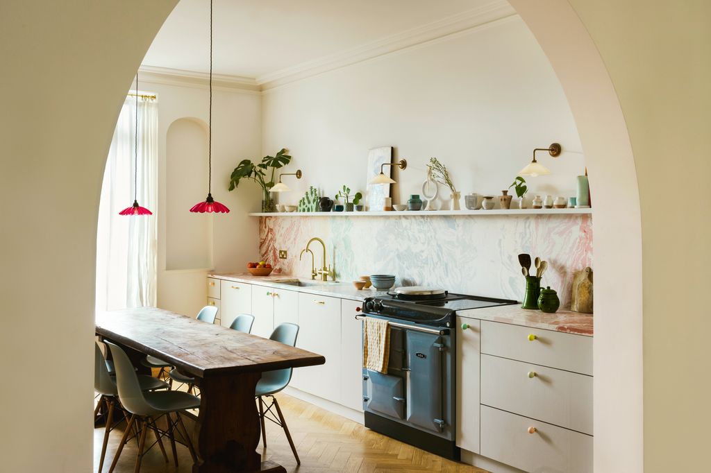 Image may contain Architecture Building Dining Room Dining Table Furniture Indoors Room Table and Interior Design