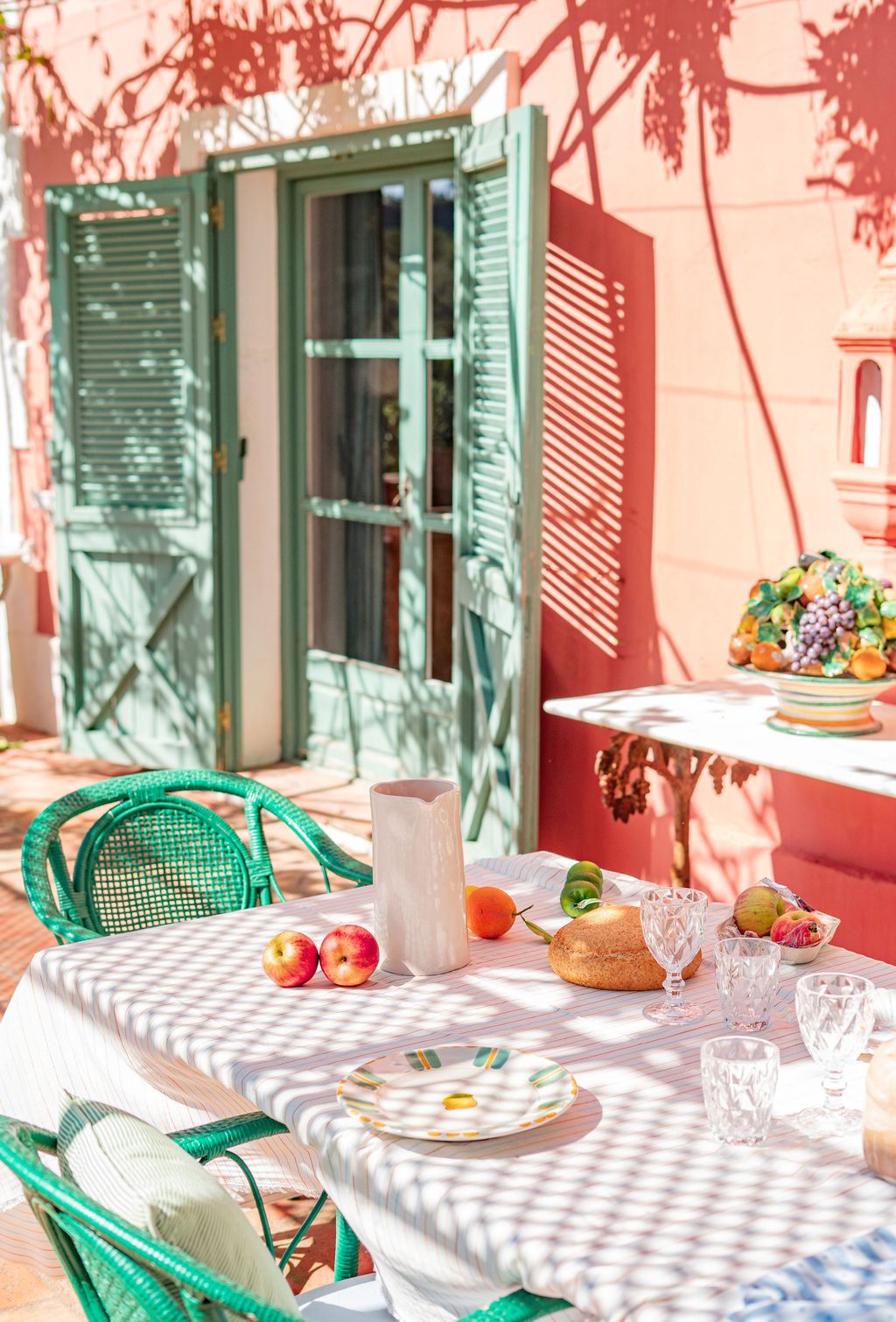 Image may contain Furniture Table Cup Dining Table Tabletop Plate Chair Home Decor Apple Food Fruit and Plant