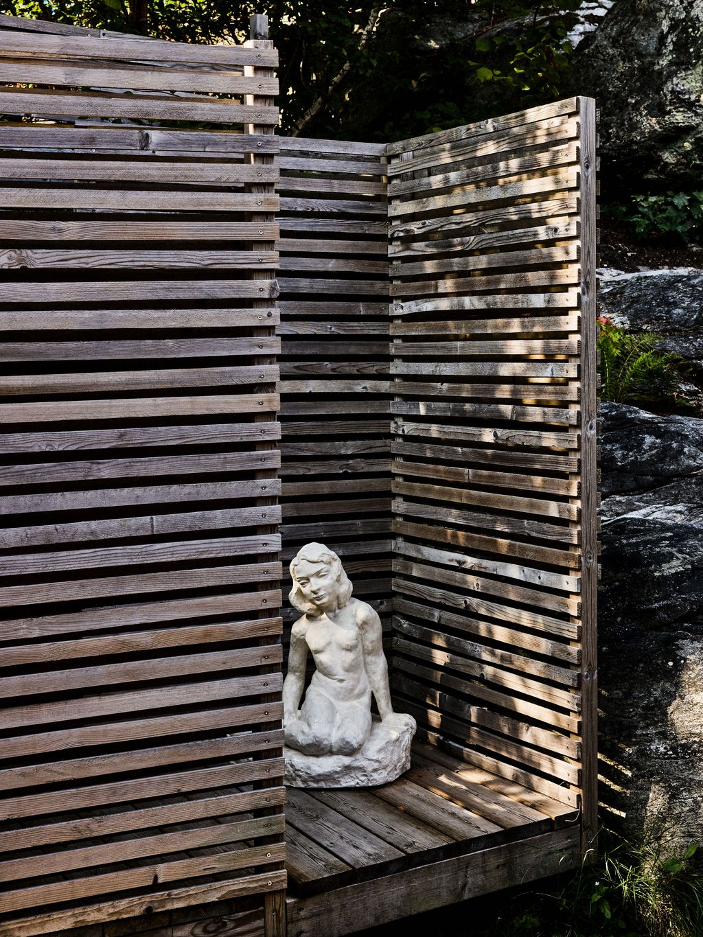 Image may contain Wood Slate Adult Person and Art