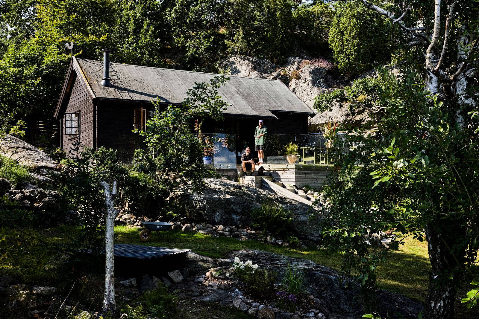 Image may contain Architecture Building Cottage House Housing Person Plant Cabin Outdoors and Shelter