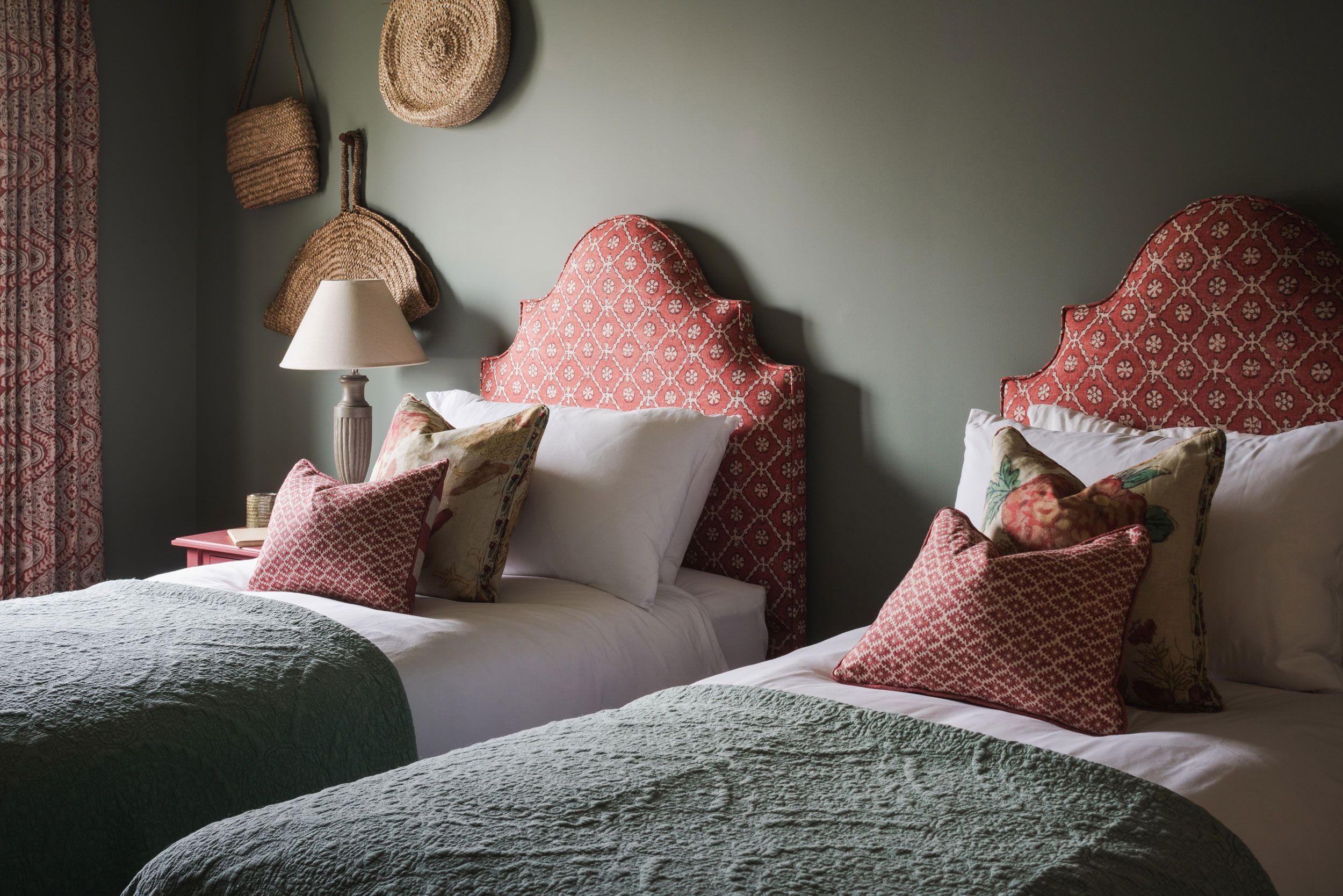 Image may contain: Cushion, Home Decor, Lamp, Pillow, Bed, Furniture, Accessories, Bag, Handbag, Clothing, Hat, and Cup