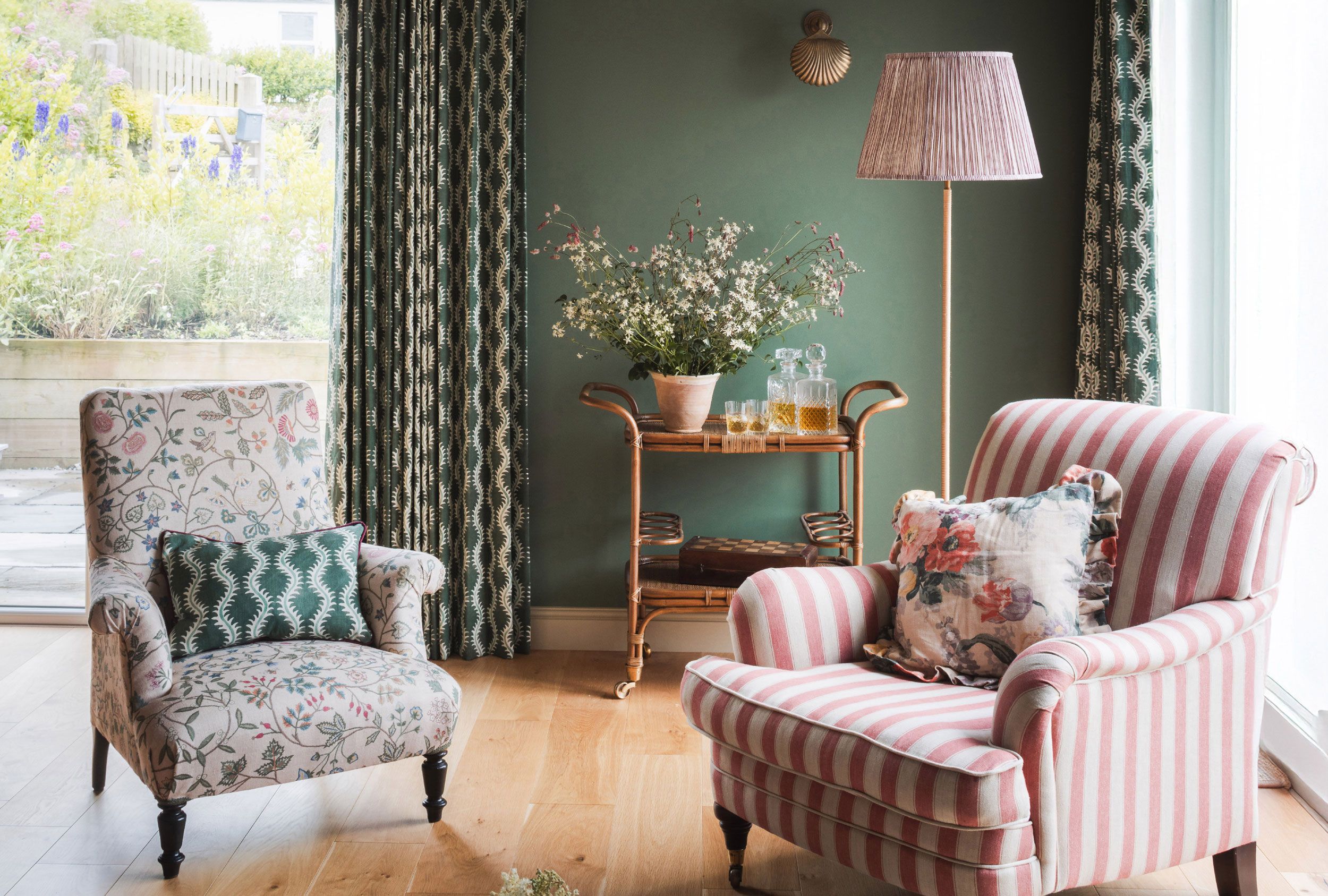 Image may contain: Chair, Furniture, Lamp, Cushion, Home Decor, Architecture, Building, Indoors, Living Room, and Room