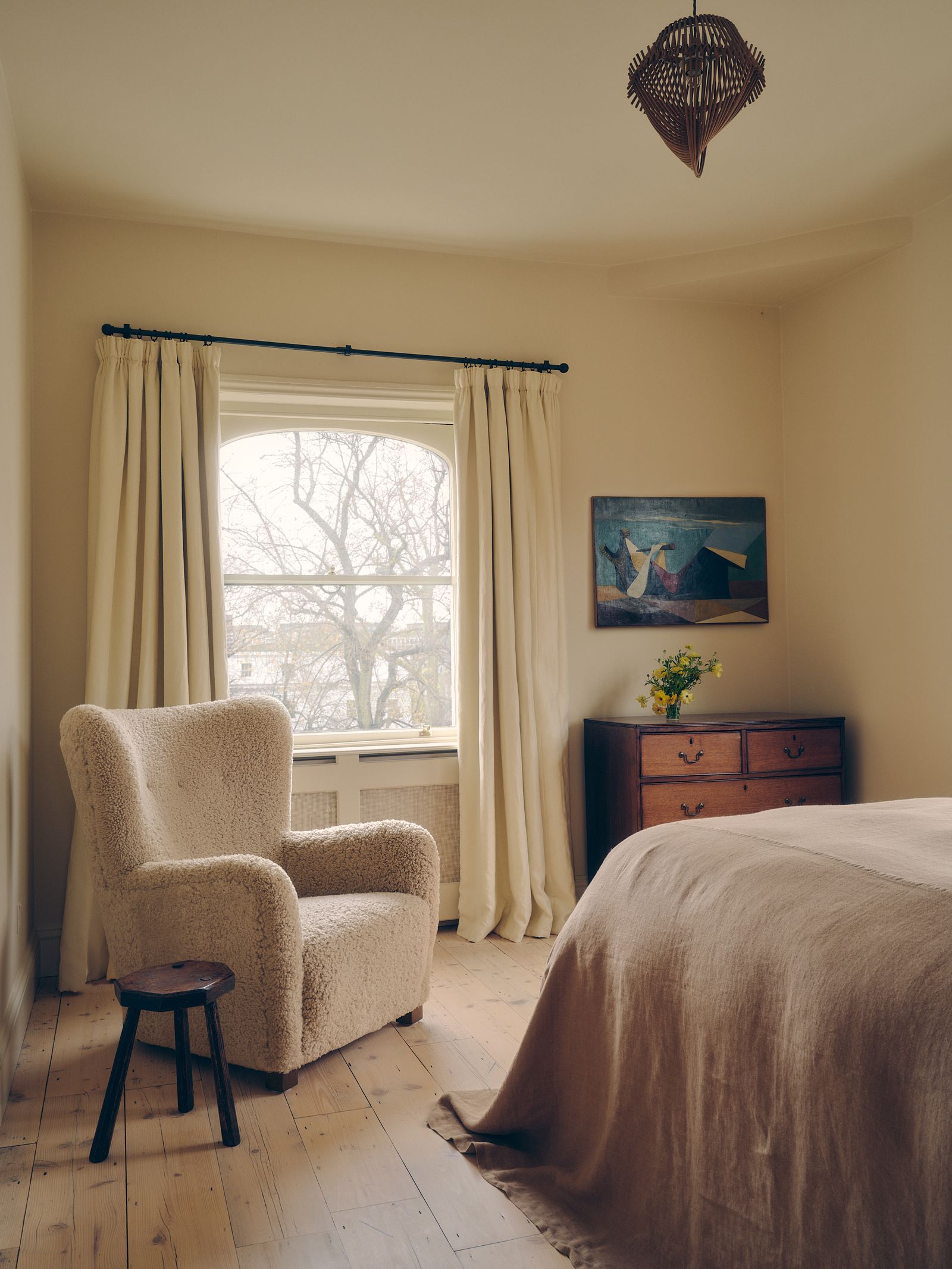 Image may contain Bed Furniture Lamp Home Decor Indoors Interior Design Window Architecture and Building