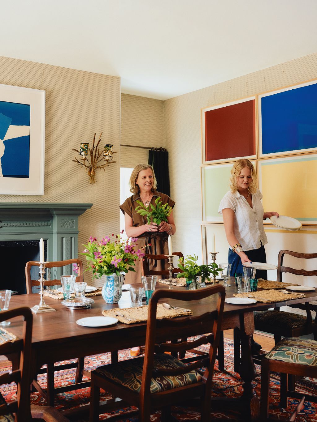 Image may contain Meg Whitman Architecture Building Dining Room Dining Table Furniture Indoors Room Table and Cup