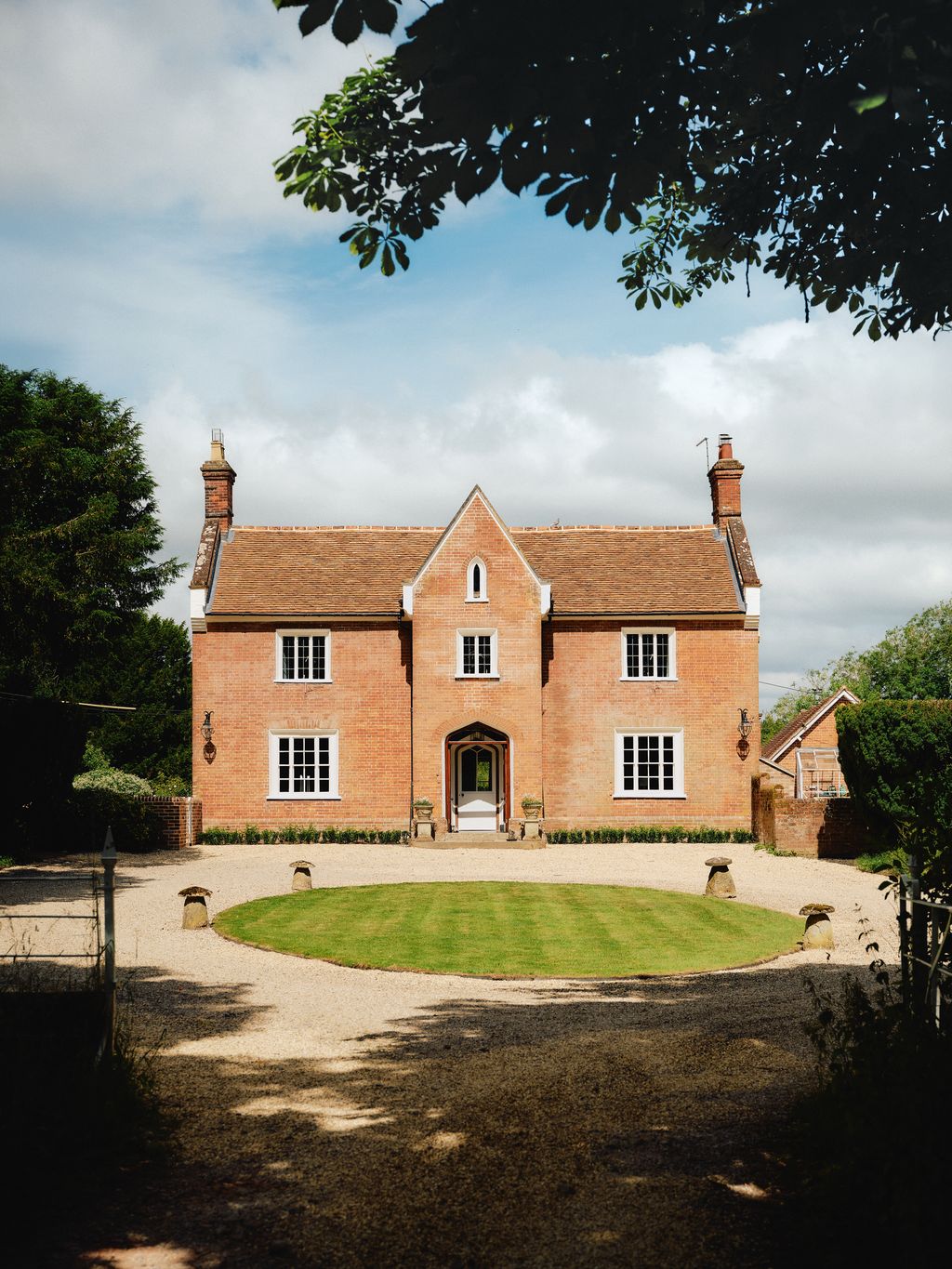Image may contain Architecture Building Housing House Manor Plant and Outdoors