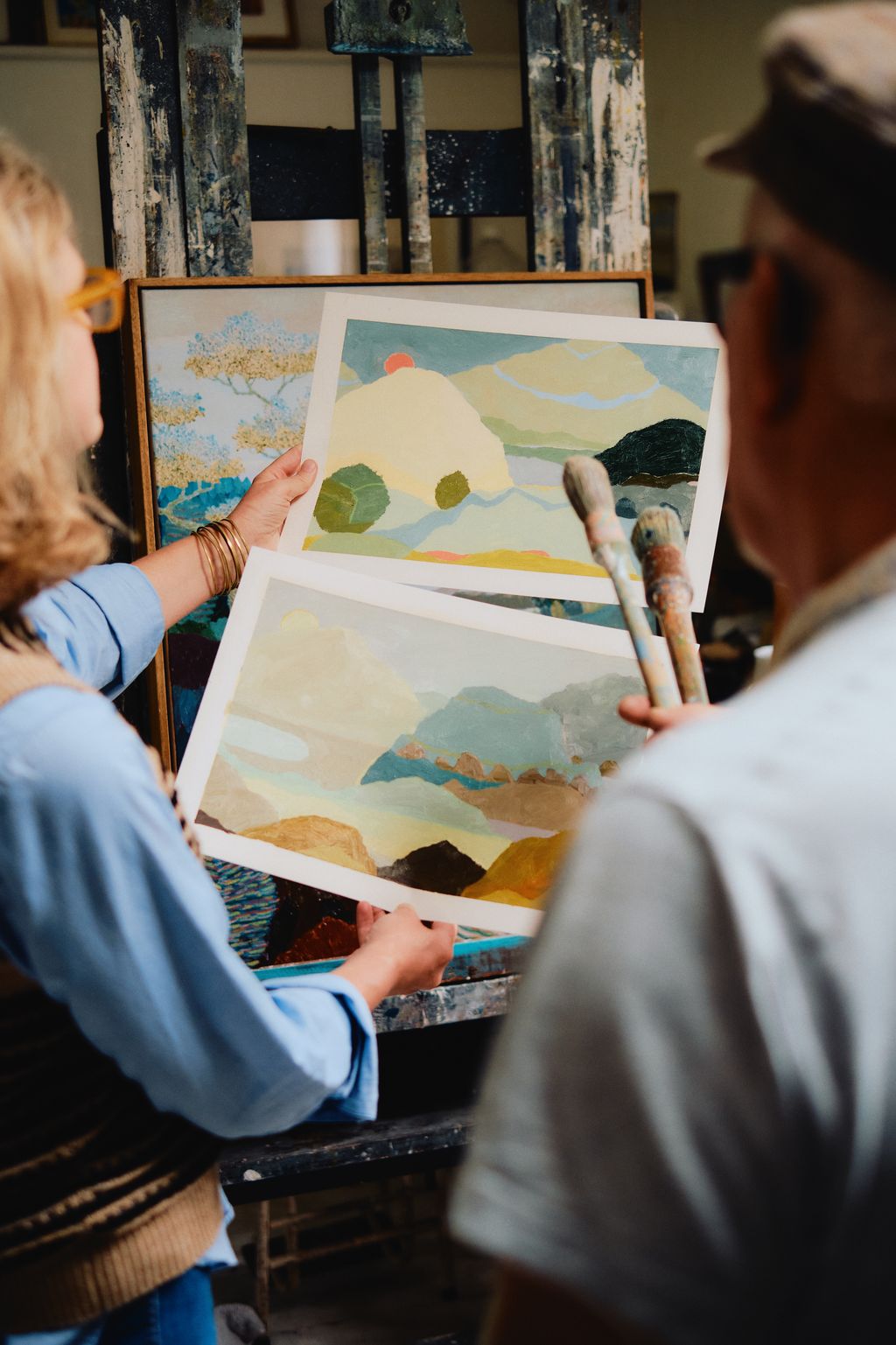 Image may contain Canvas Adult Person Clothing Hat Accessories Glasses Art and Painting