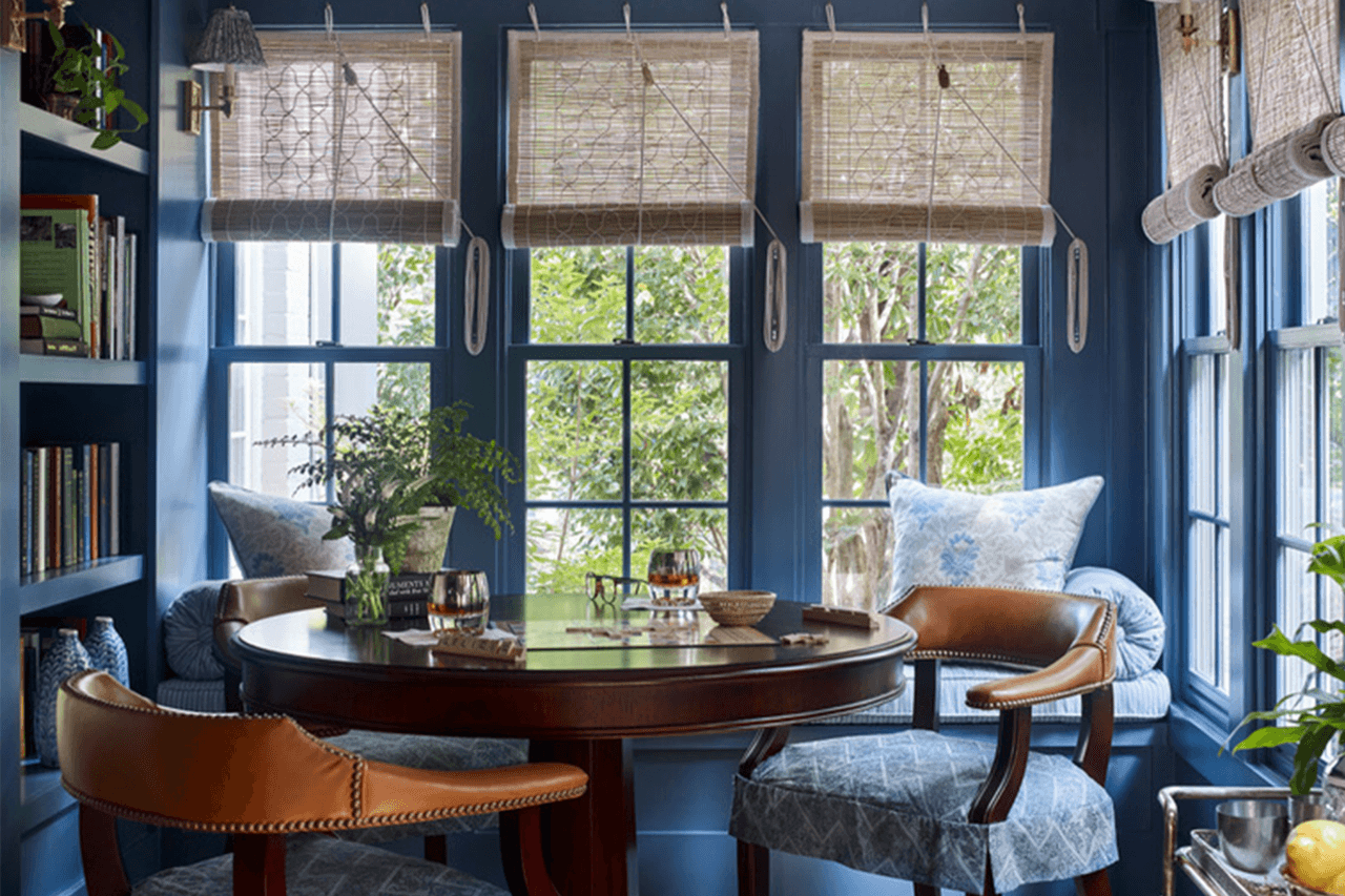 Image may contain: Window, Furniture, Table, Chair, Home Decor, Plant, French Window, Tabletop, and Bay Window