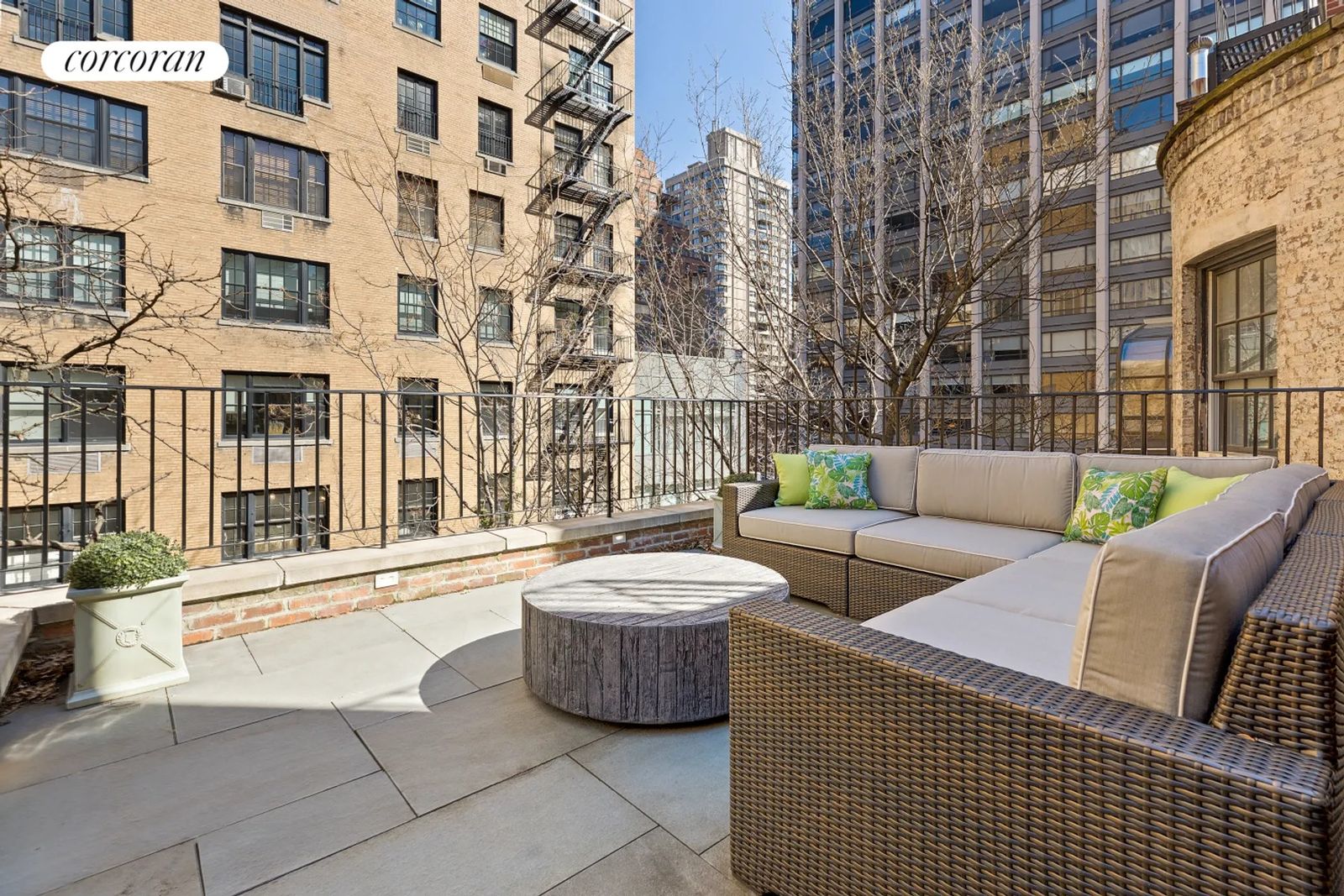 Image may contain City Plant Couch Furniture Urban Architecture Building Condo Housing Balcony and Terrace