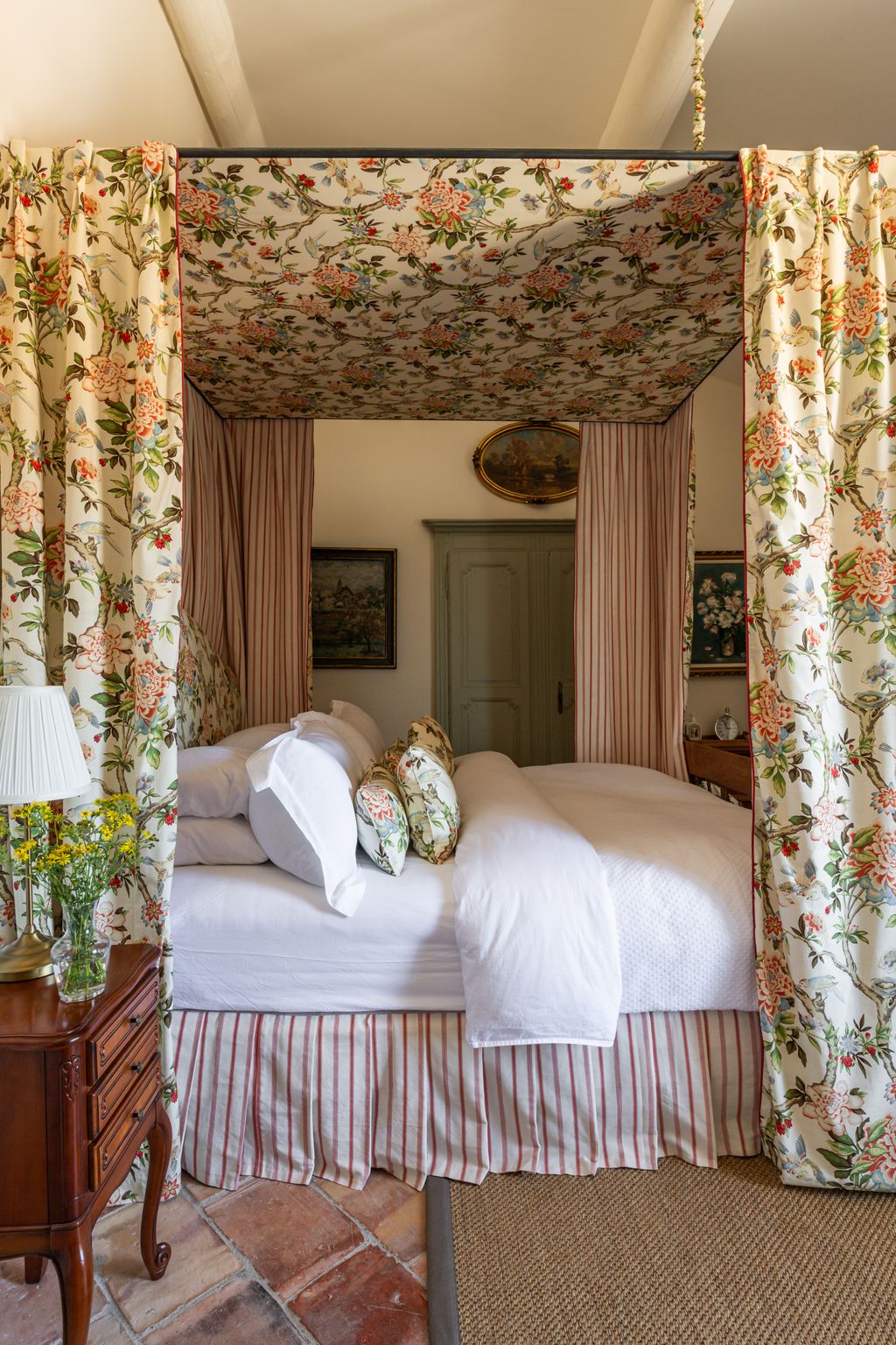 Image may contain Furniture Bed Bedroom Indoors Room Lamp Art Painting and Canopy Bed