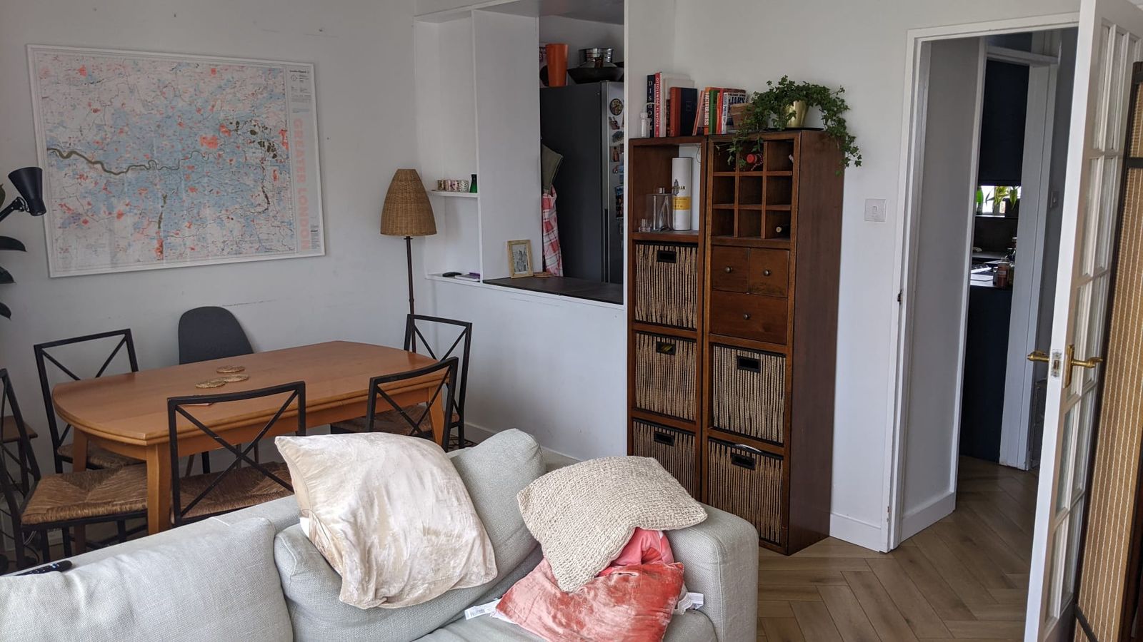 Image may contain Plant Desk Furniture Table Home Decor Couch Lamp Art Painting Appliance and Device