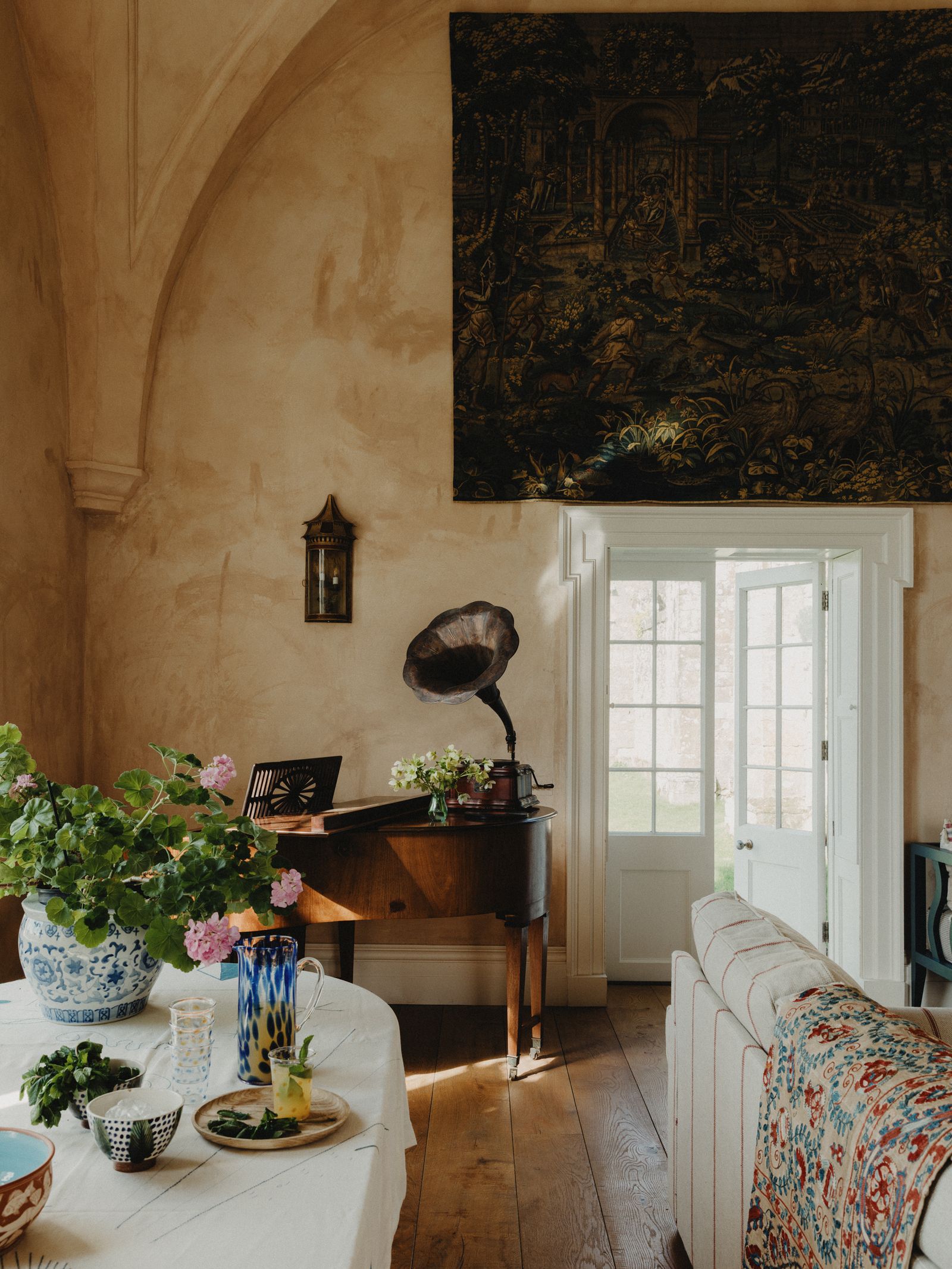 Image may contain Indoors Interior Design Plant Potted Plant Architecture Building Furniture Living Room and Room