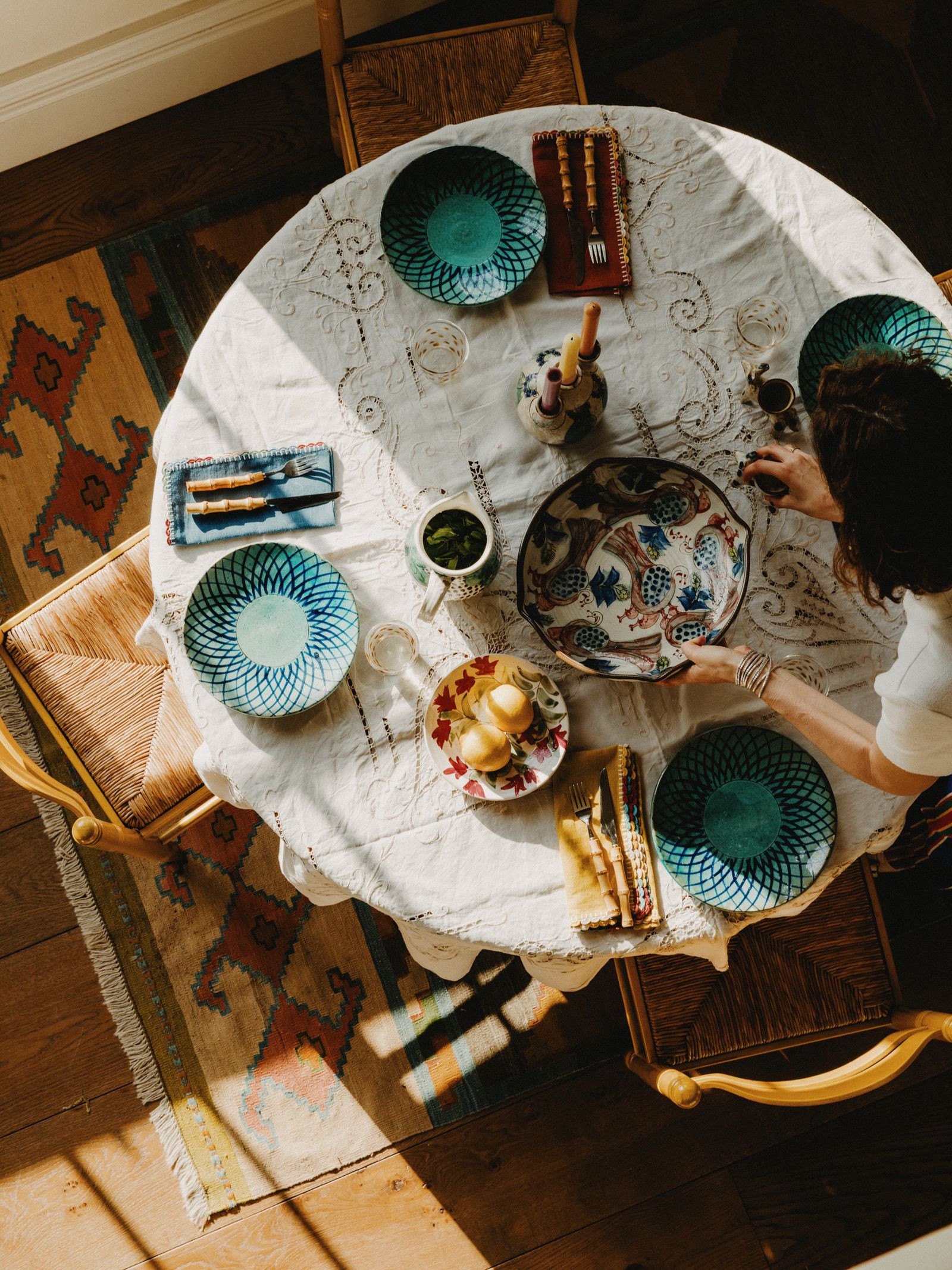 Image may contain Brunch Food Furniture Table Tabletop Plate Egg Adult Person Chair Cutlery and Fork