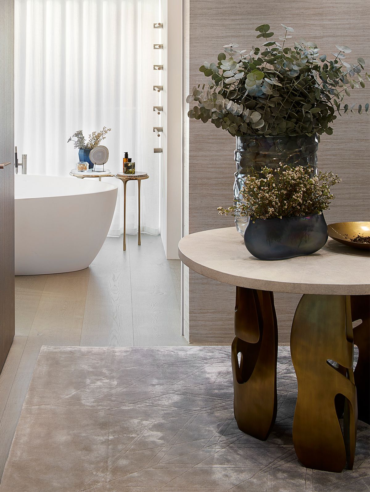 Image may contain: Floor, Plant, Potted Plant, Flooring, Indoors, Interior Design, Desk, Furniture, Table, and Home Decor