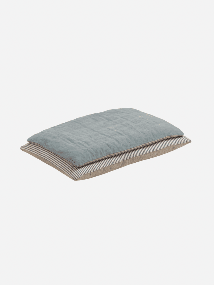 Image may contain: Cushion, Home Decor, Pillow, Furniture, and Bed