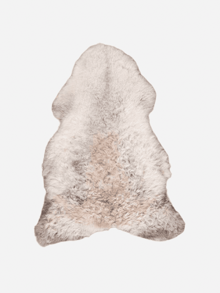 Image may contain: Home Decor, Rug, Animal, Bear, Mammal, Wildlife, and Cushion