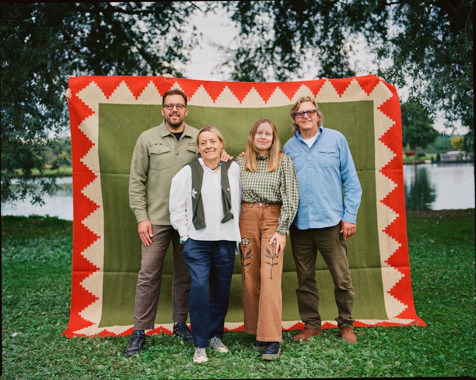 Image may contain Susanna Wallumrød Clothing Pants Grass Plant Face Head Person Photography Portrait and People