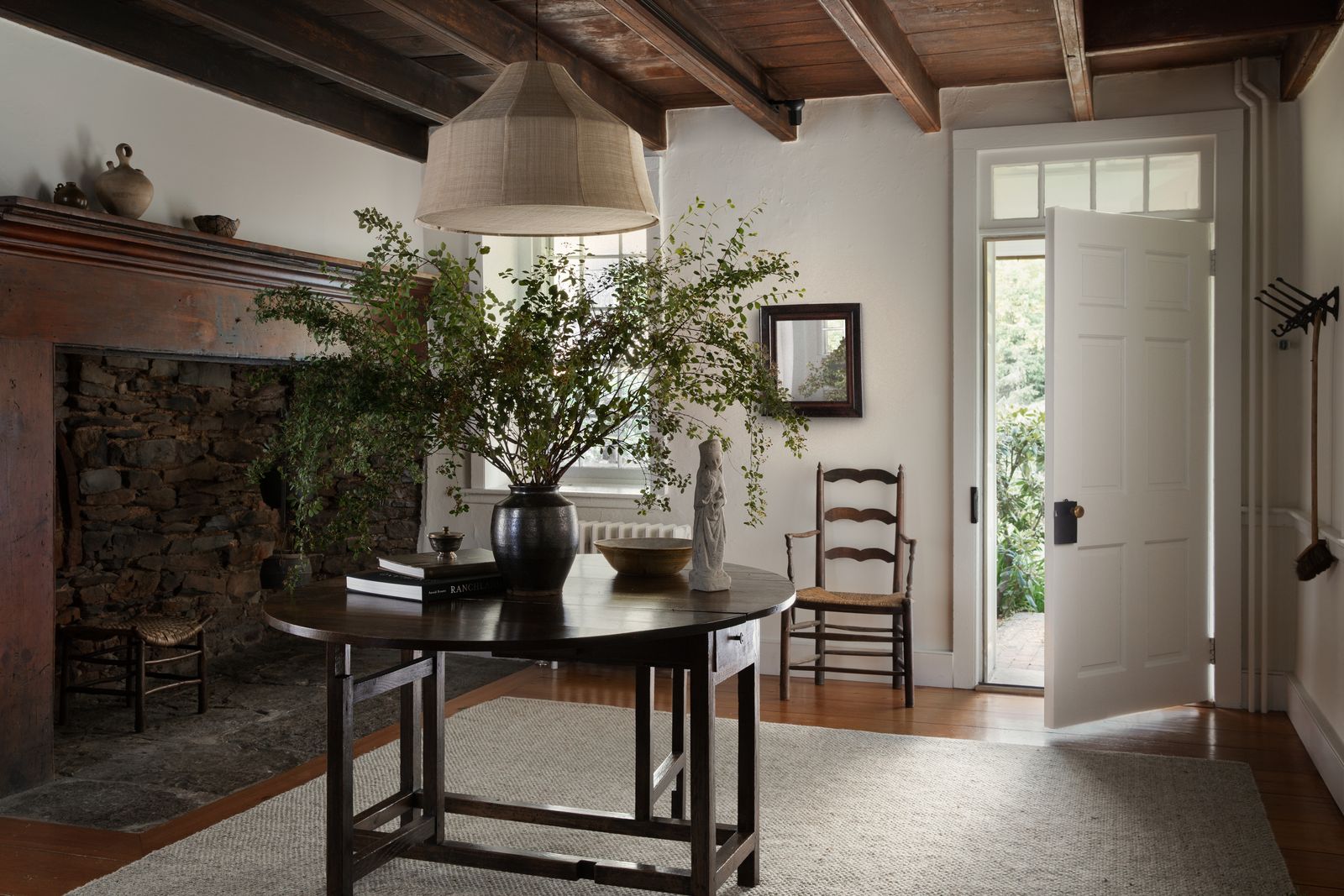 Image may contain Lamp Architecture Building Dining Room Dining Table Furniture Indoors Room and Table