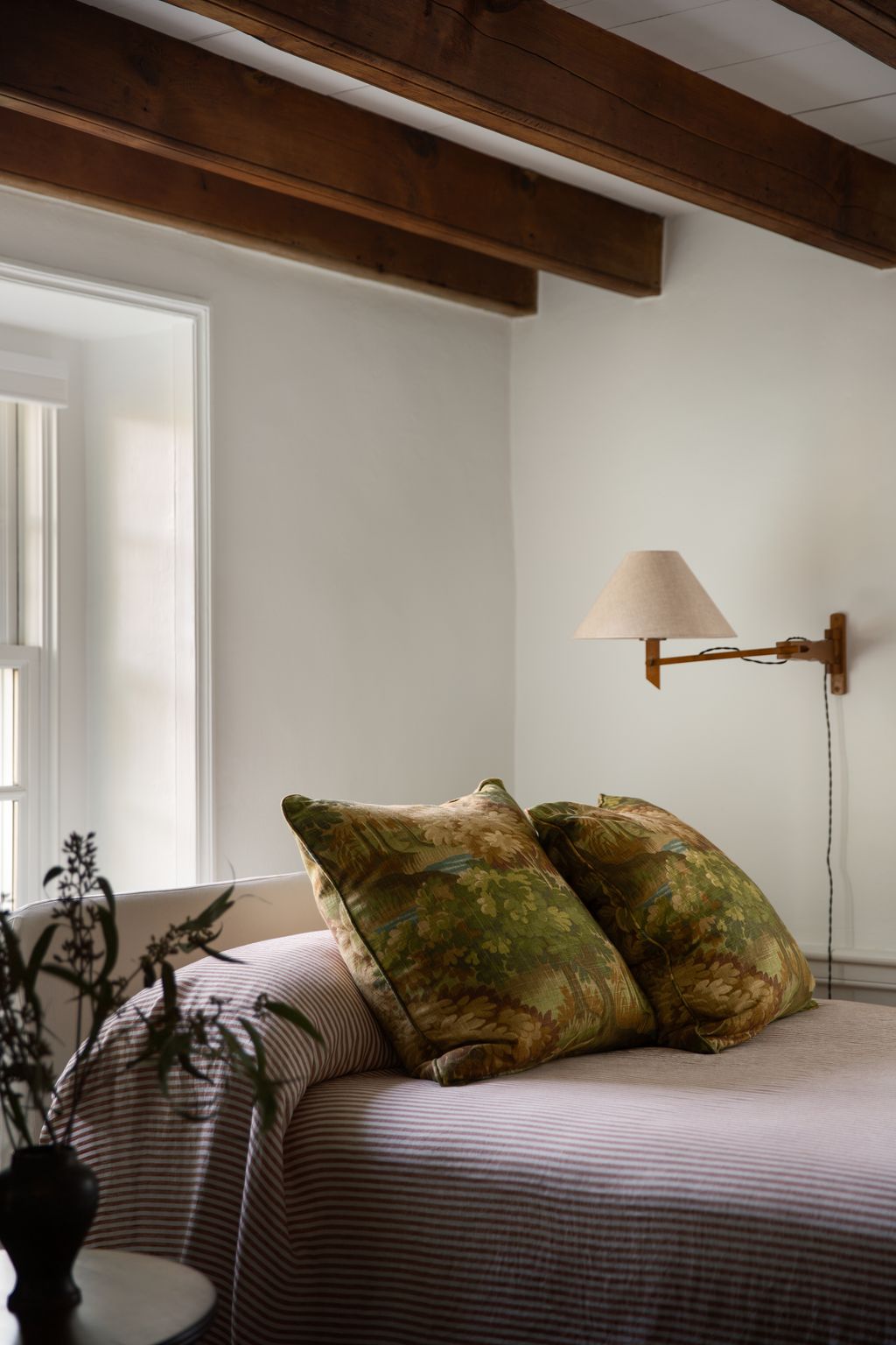 Image may contain Cushion Home Decor Indoors Interior Design Lamp Pillow Bed and Furniture