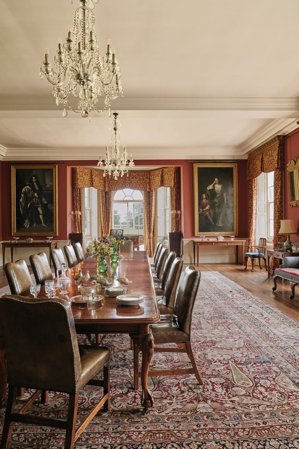 Image may contain Architecture Building Dining Room Dining Table Furniture Indoors Room Table Chandelier and Lamp