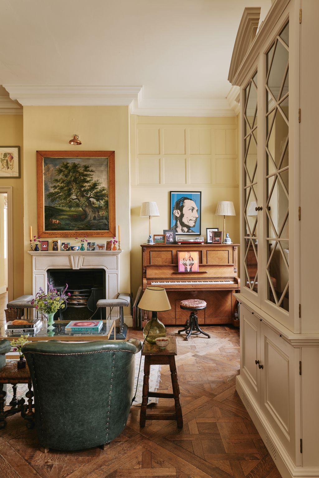 Image may contain Charlie Watts Lamp Indoors Interior Design Art Painting Keyboard Musical Instrument and Piano